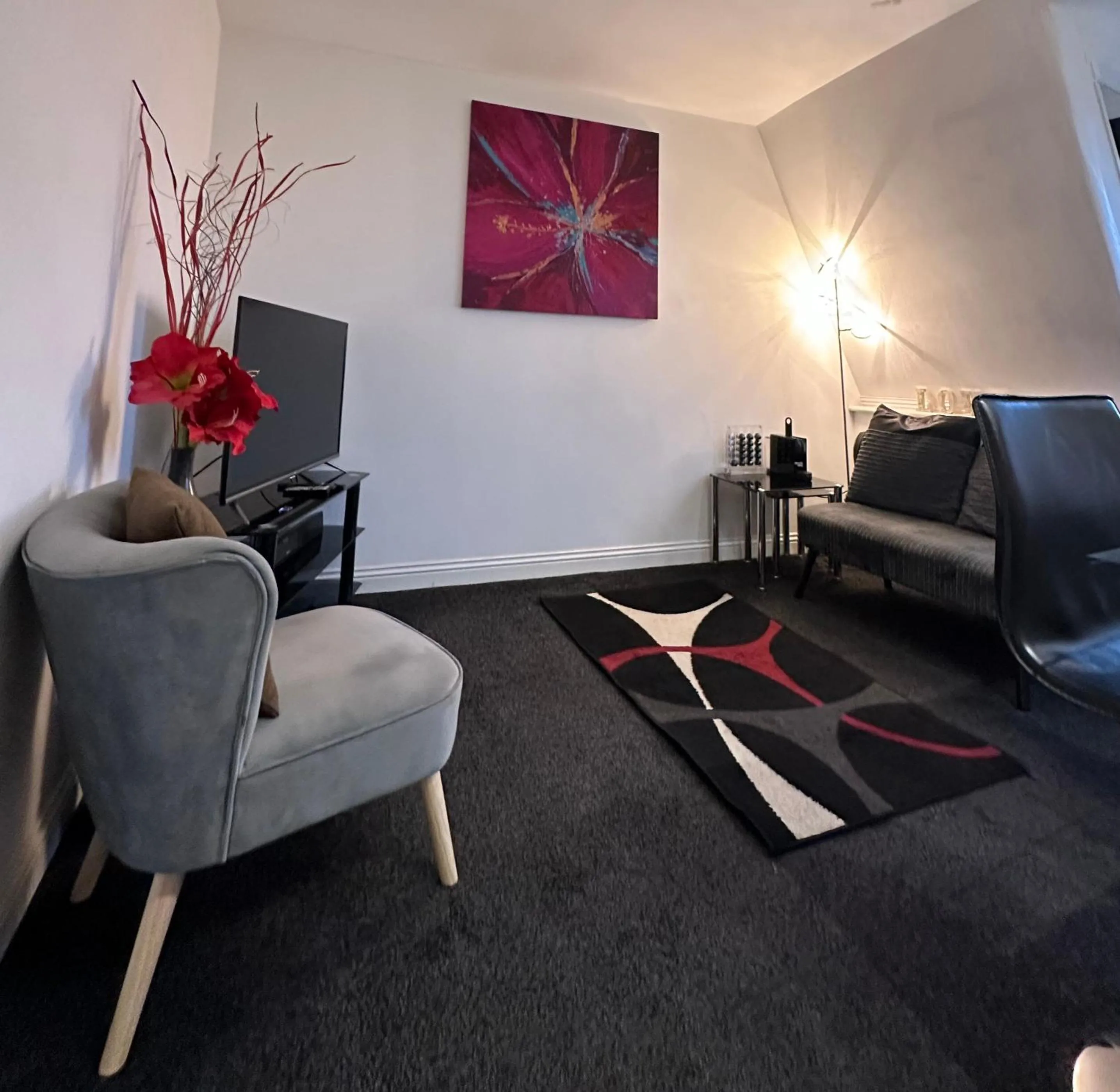 Living room in The Carlton's Holiday Suites