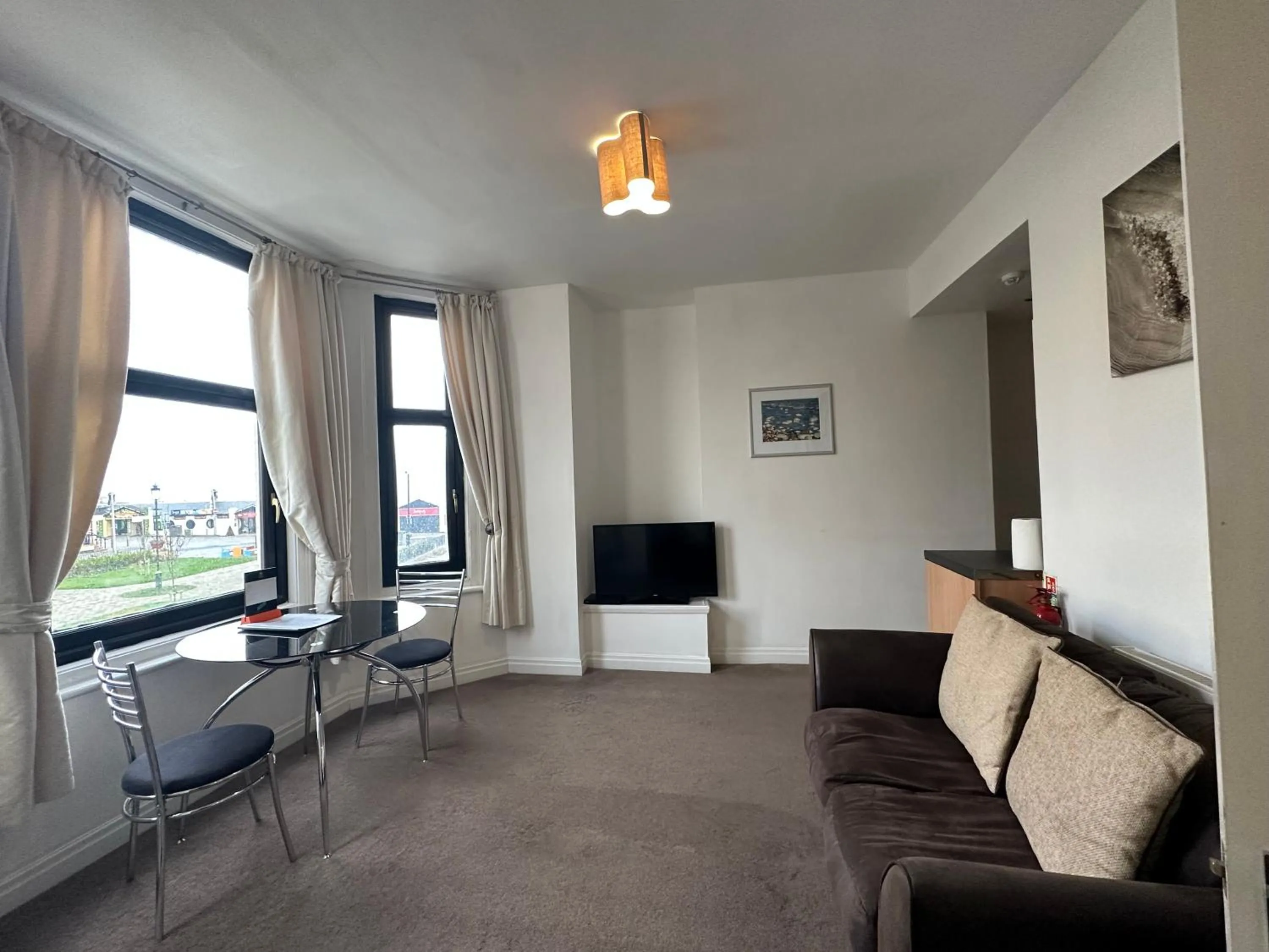 Living room in The Carlton's Holiday Suites