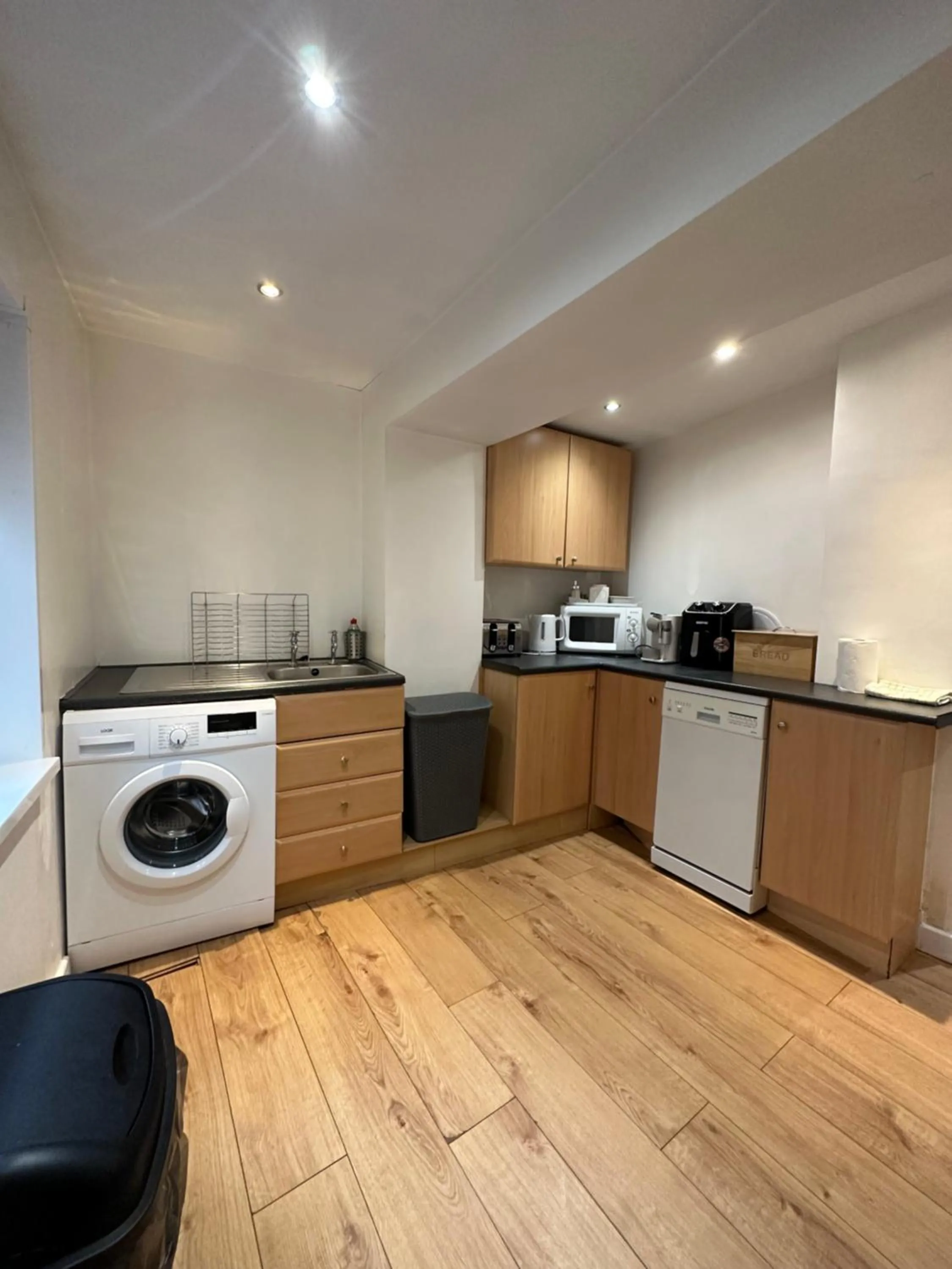Kitchen or kitchenette in The Carlton's Holiday Suites