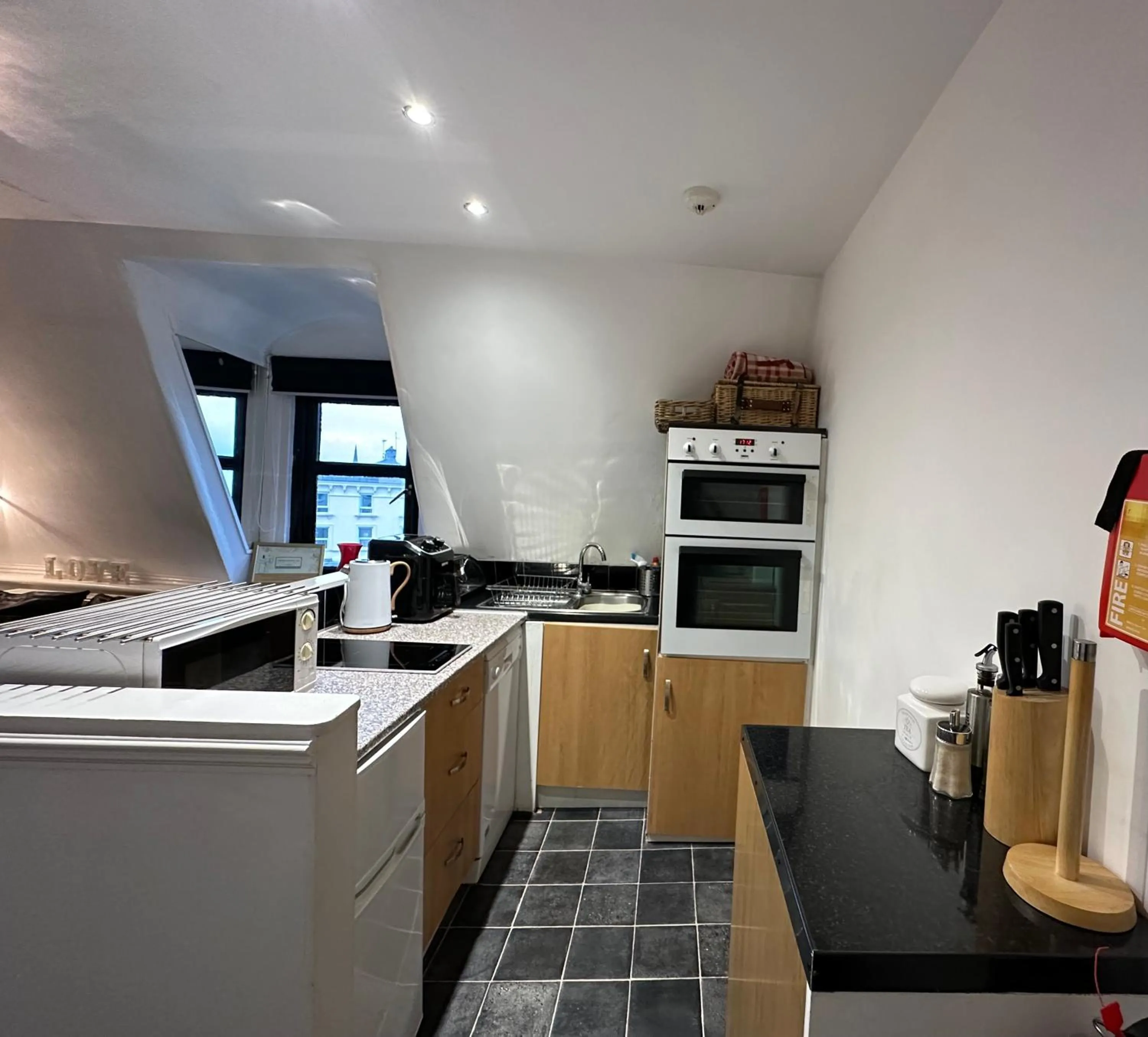 Kitchen or kitchenette in The Carlton's Holiday Suites