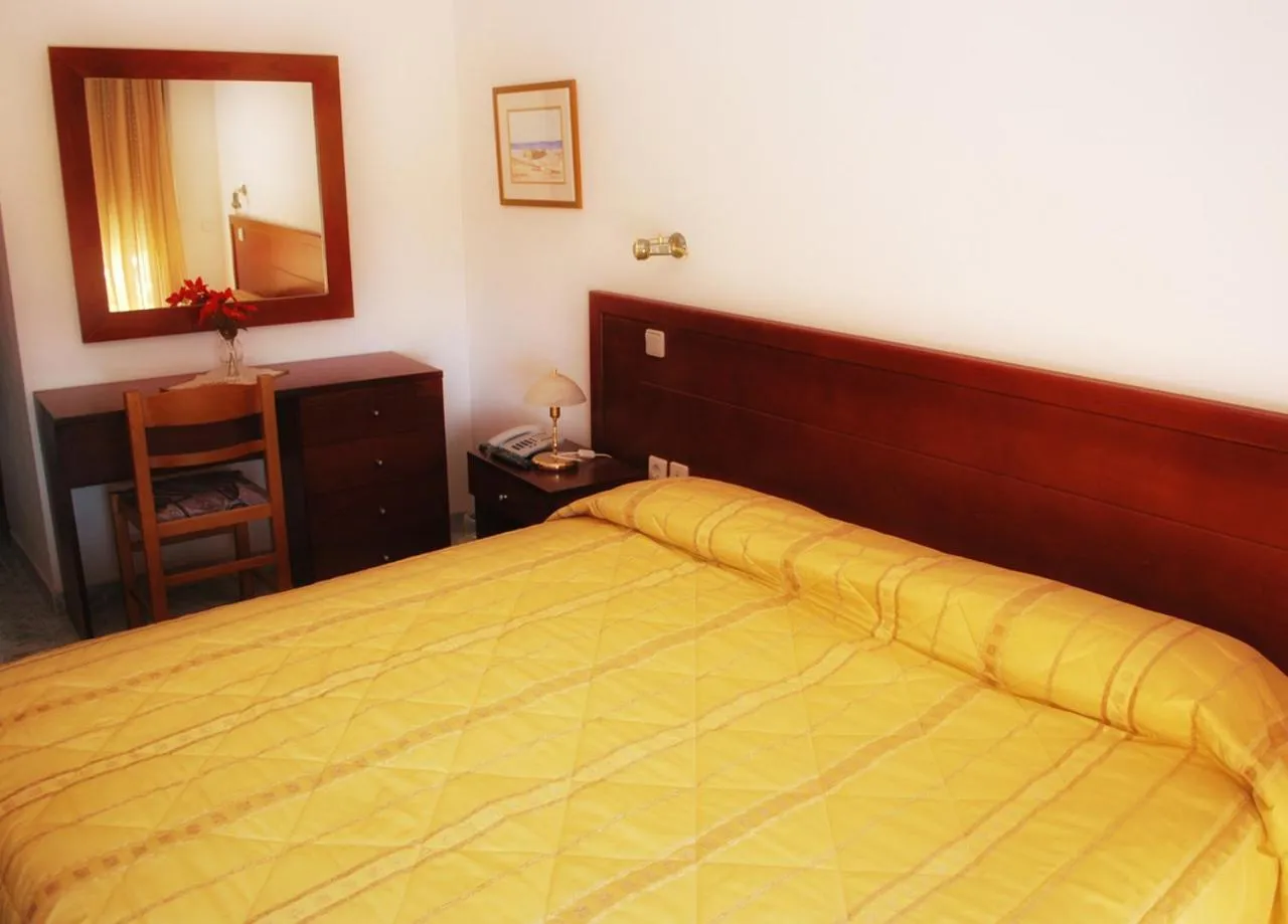 Bed in Blue Bay Hotel