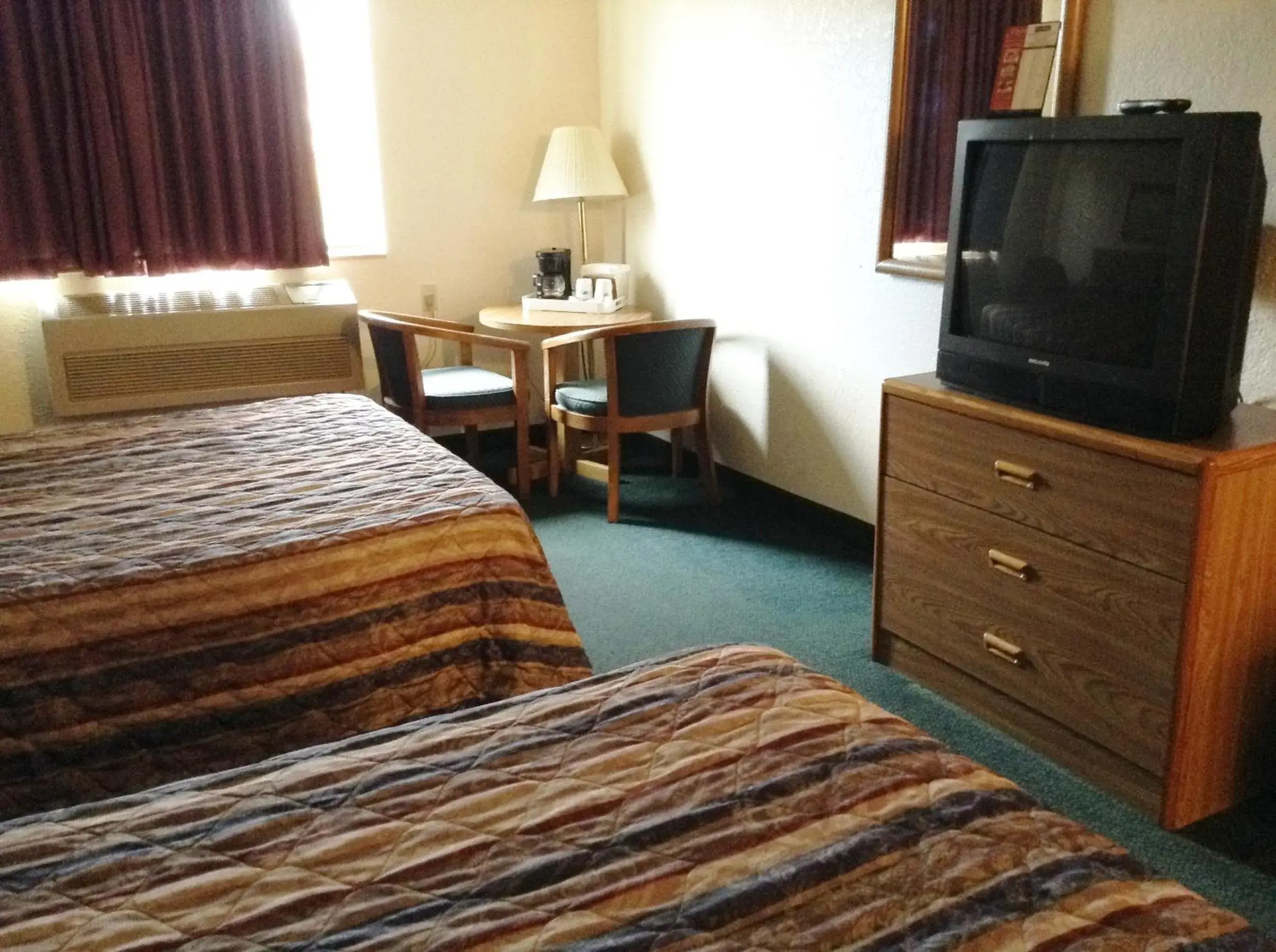 Bed in Travelodge by Wyndham Hudsonville Bed in Travelodge by Wyndham Hudsonville