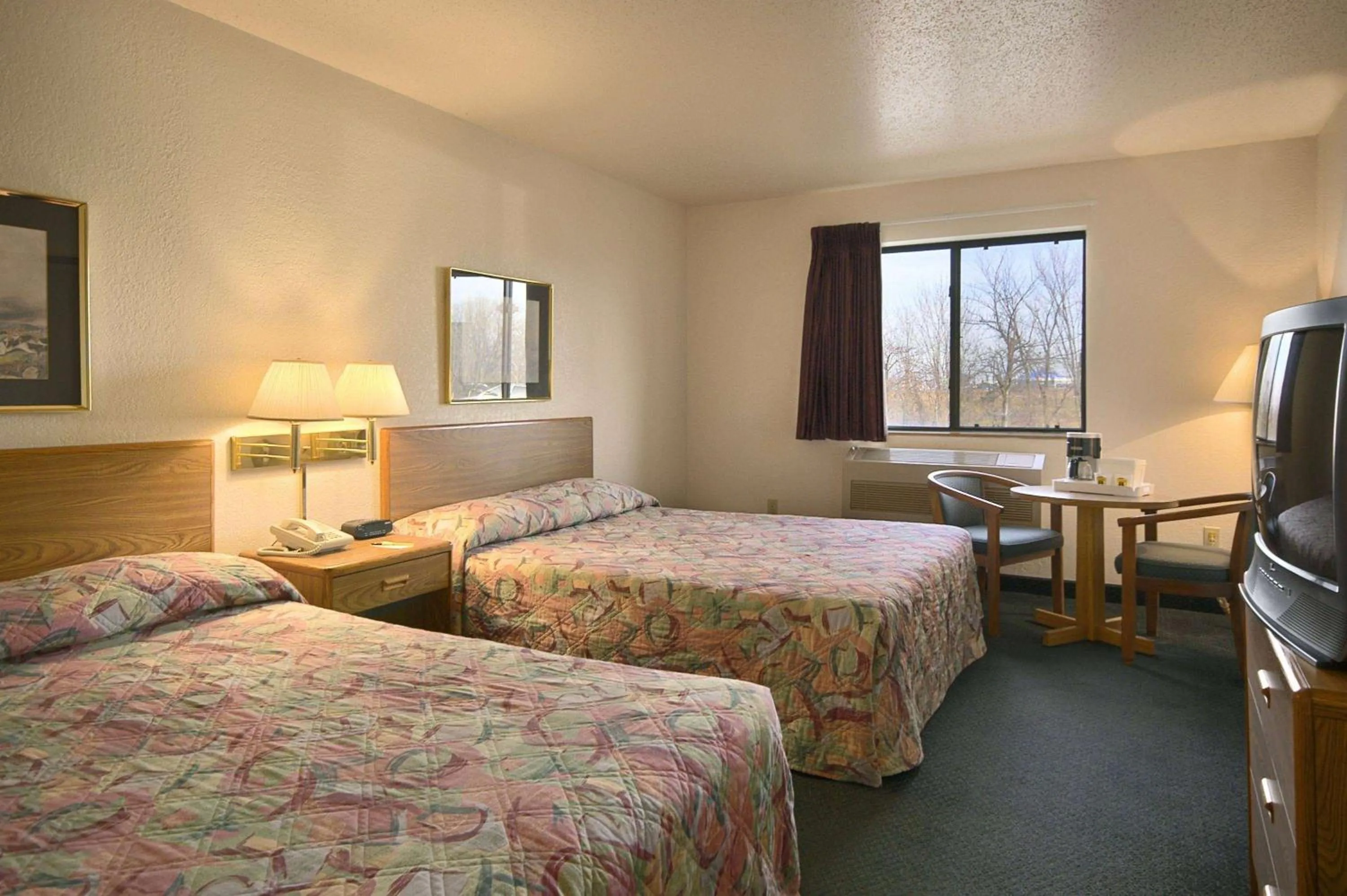 Photo of the whole room, Bed in Travelodge by Wyndham Hudsonville