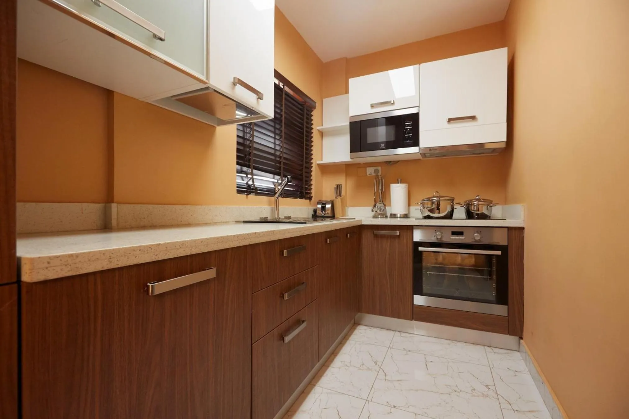 Kitchen or kitchenette in Belanova Apartments and Suites