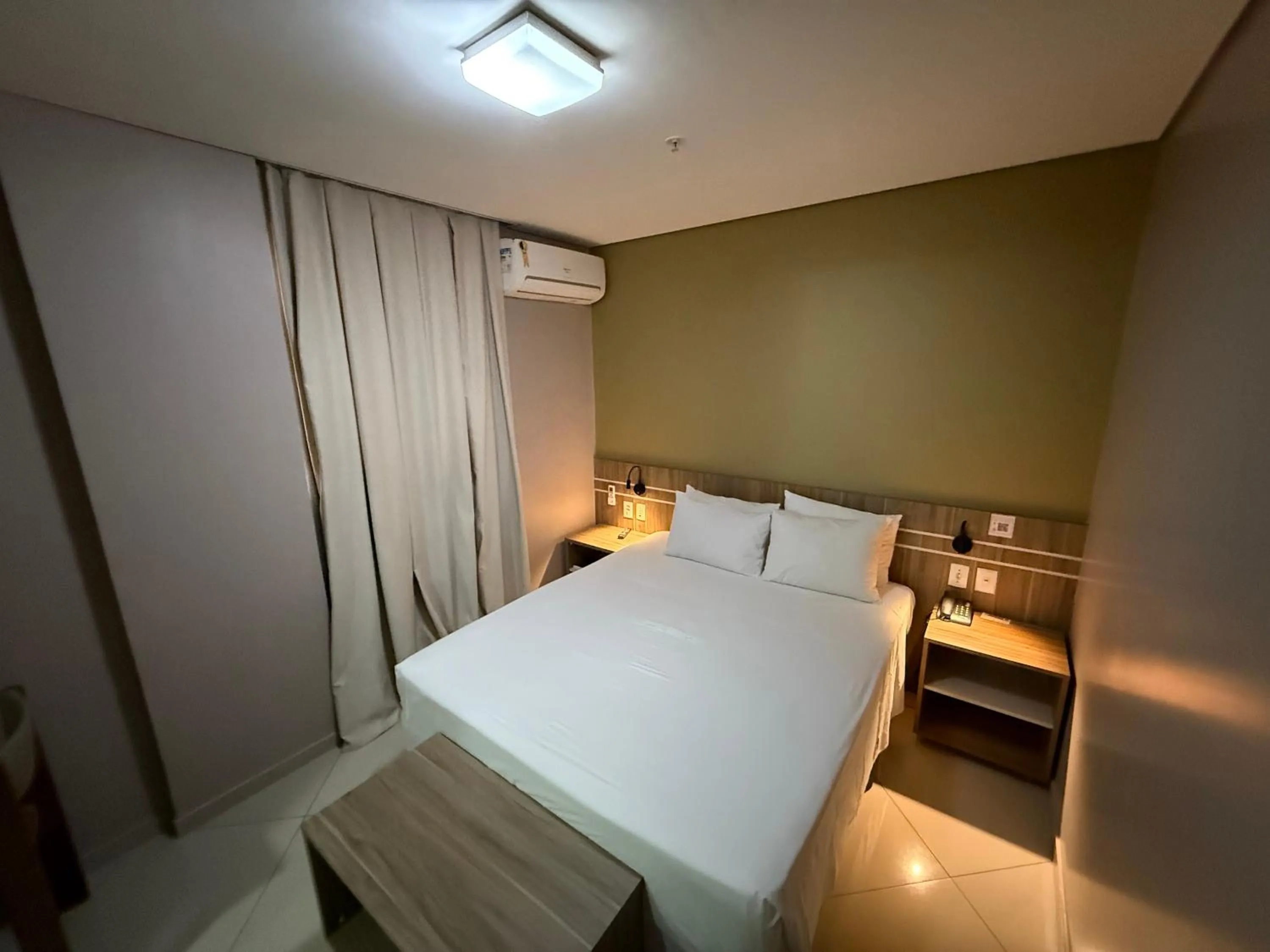 Bed in Paiaguás Palace Hotel