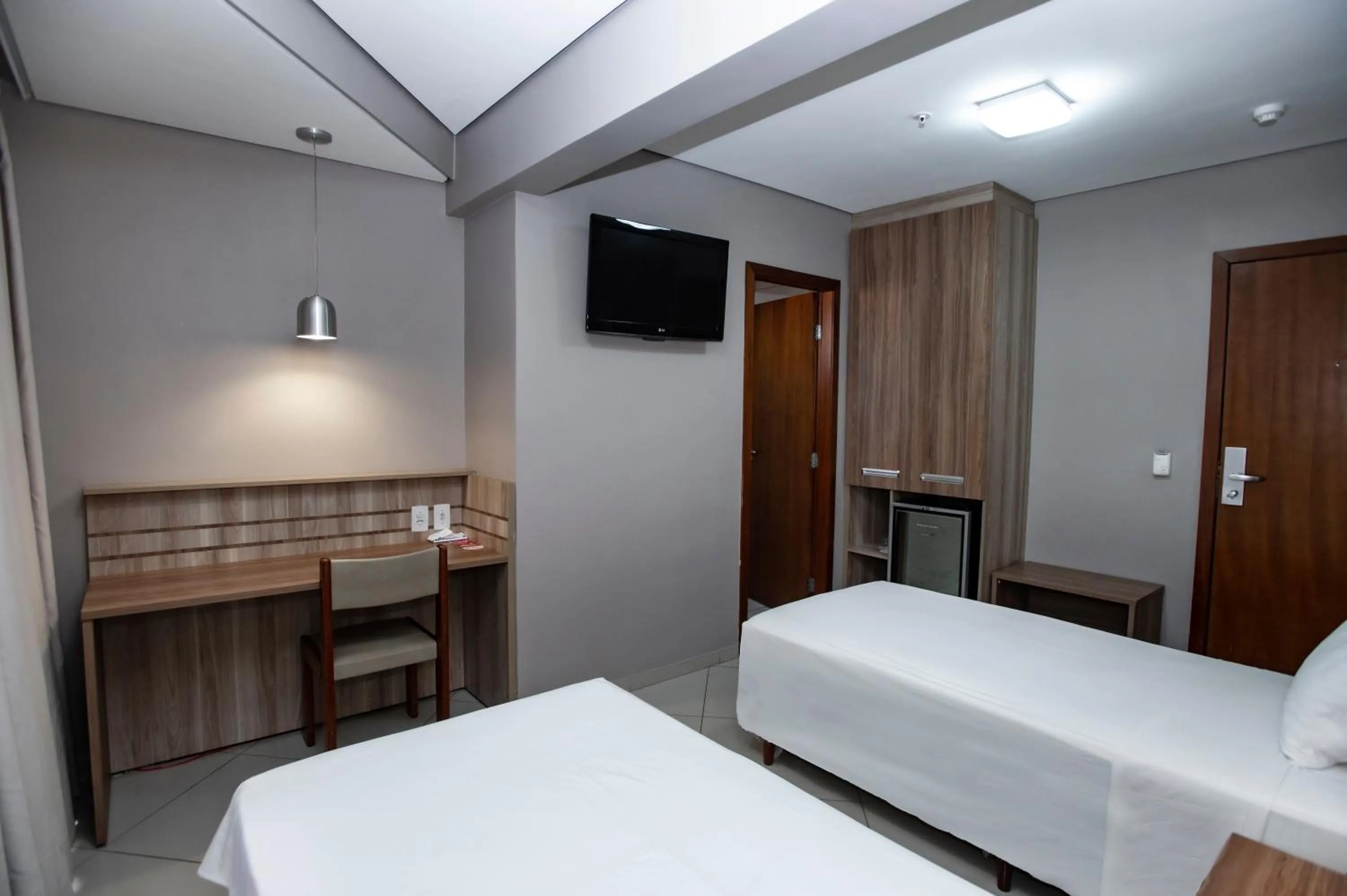 Bed in Paiaguás Palace Hotel