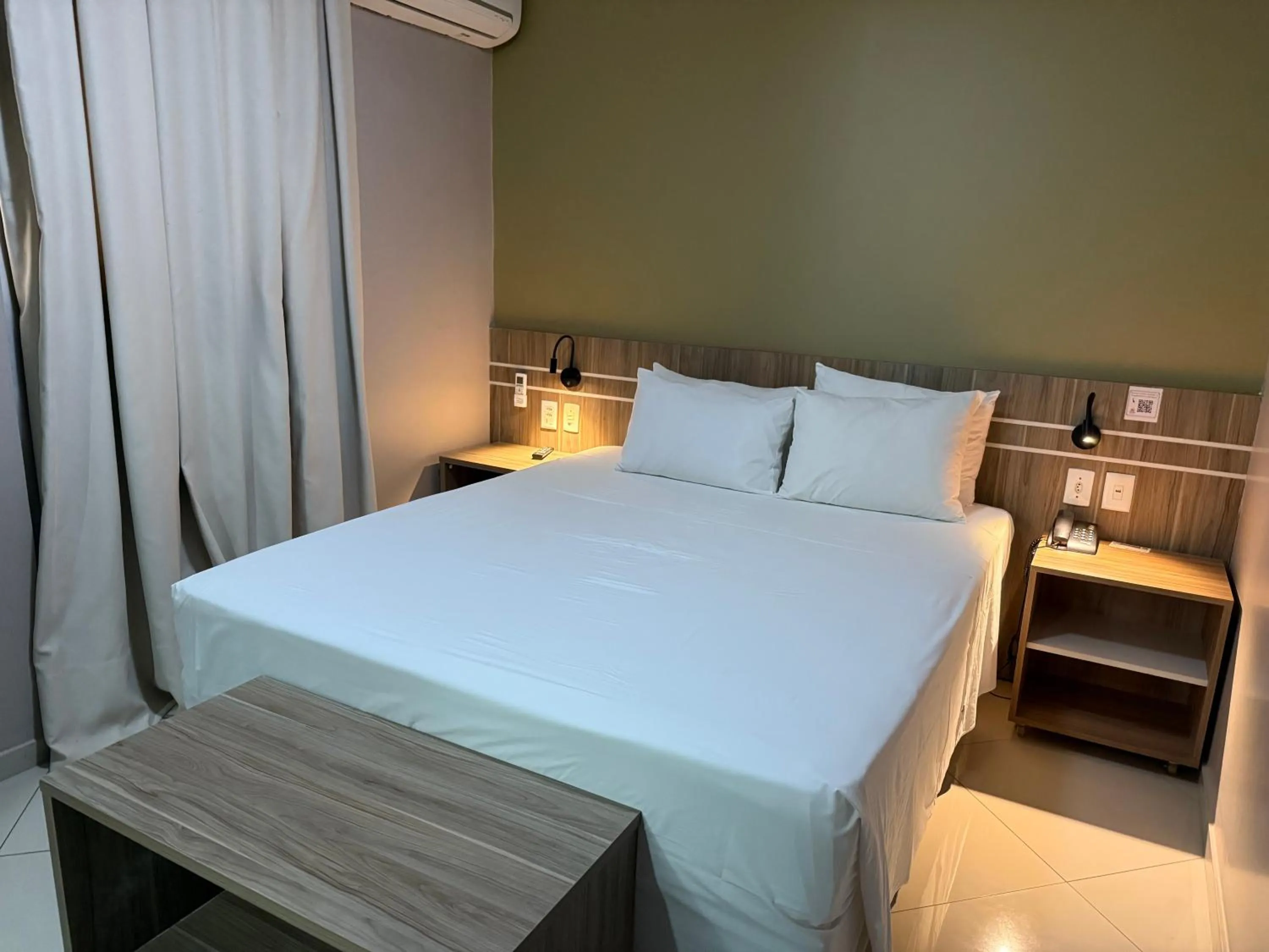 Bed in Paiaguás Palace Hotel