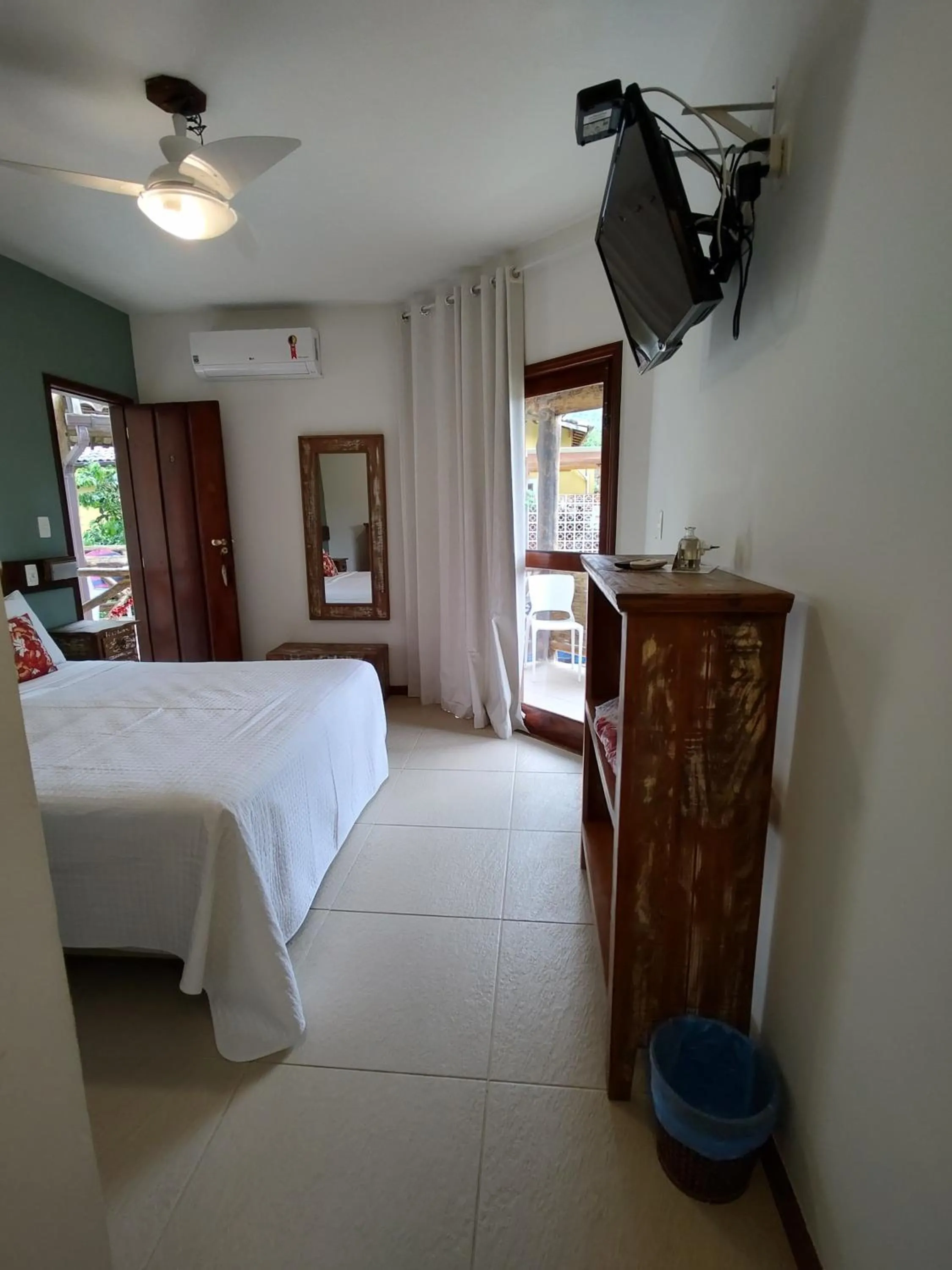 Photo of the whole room, Bed in Pousada Caiçara