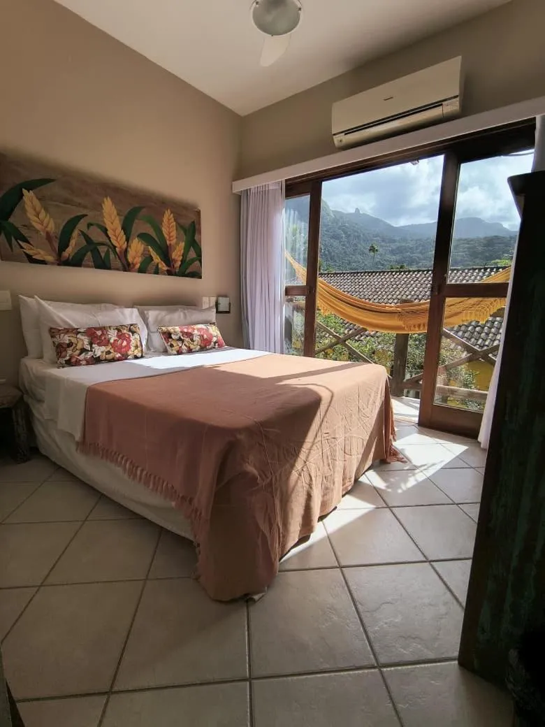 Photo of the whole room, Bed in Pousada Caiçara