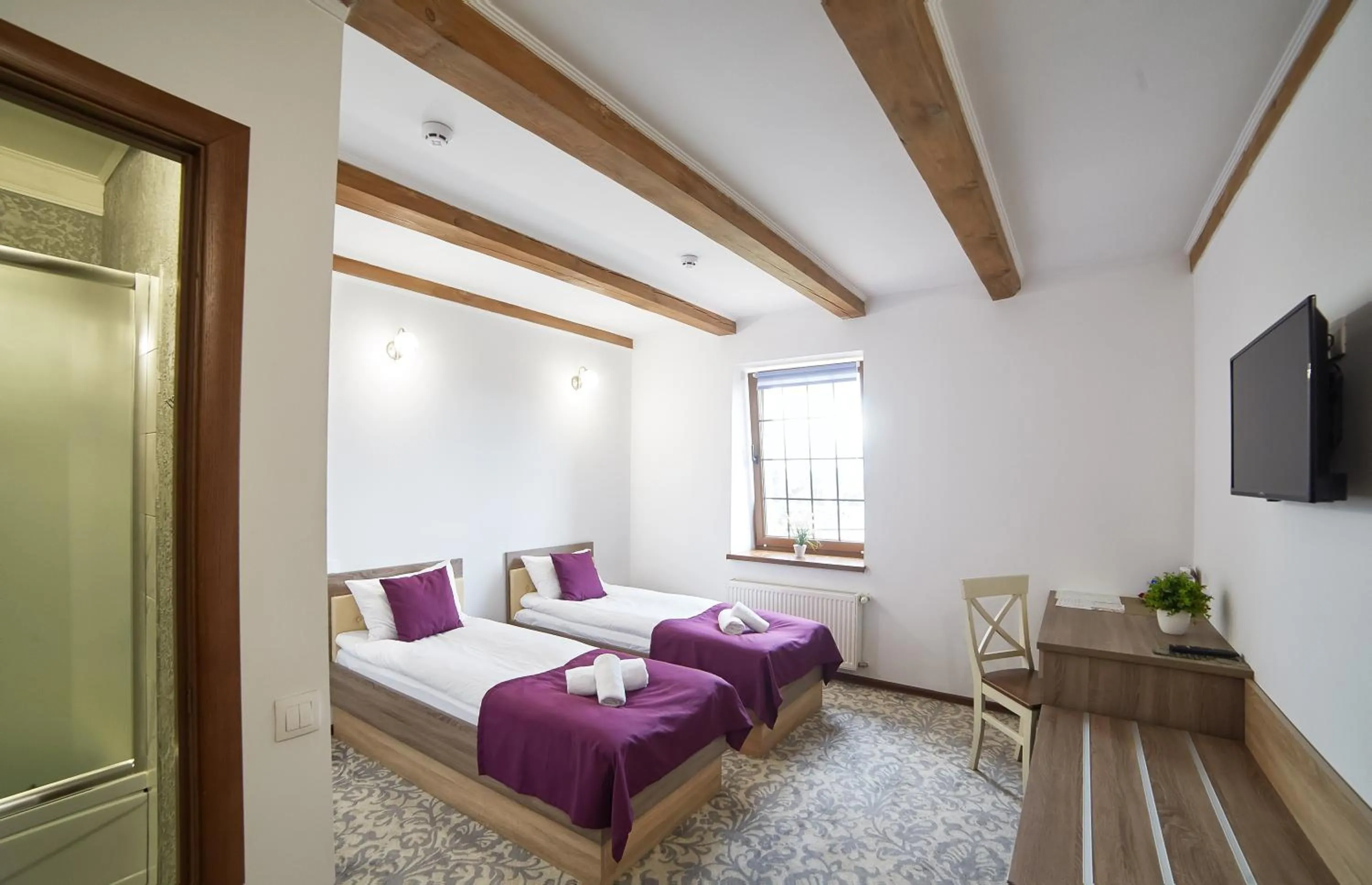 Photo of the whole room, Bed in Coin Hotel