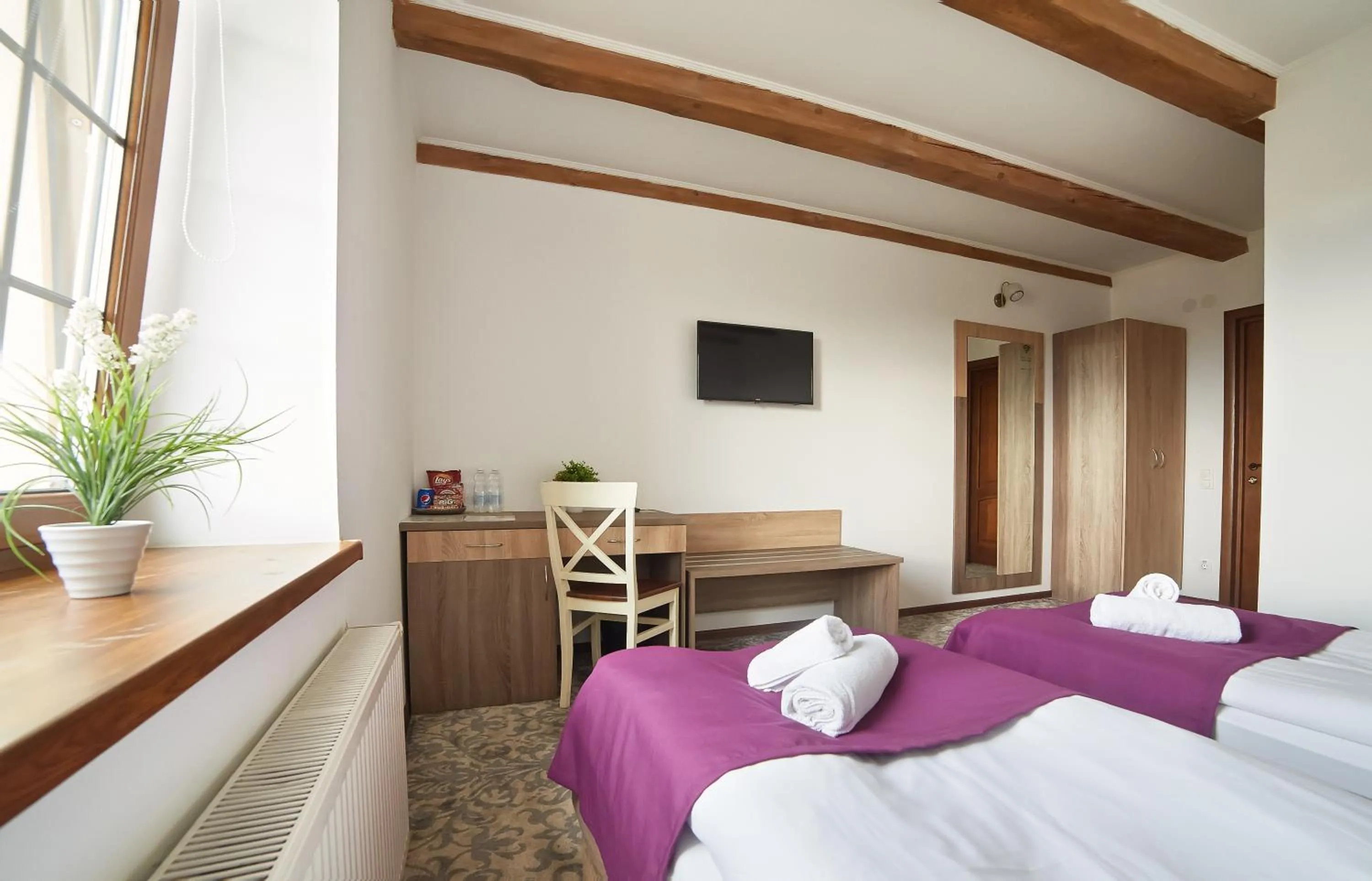 TV and multimedia, Bed in Coin Hotel