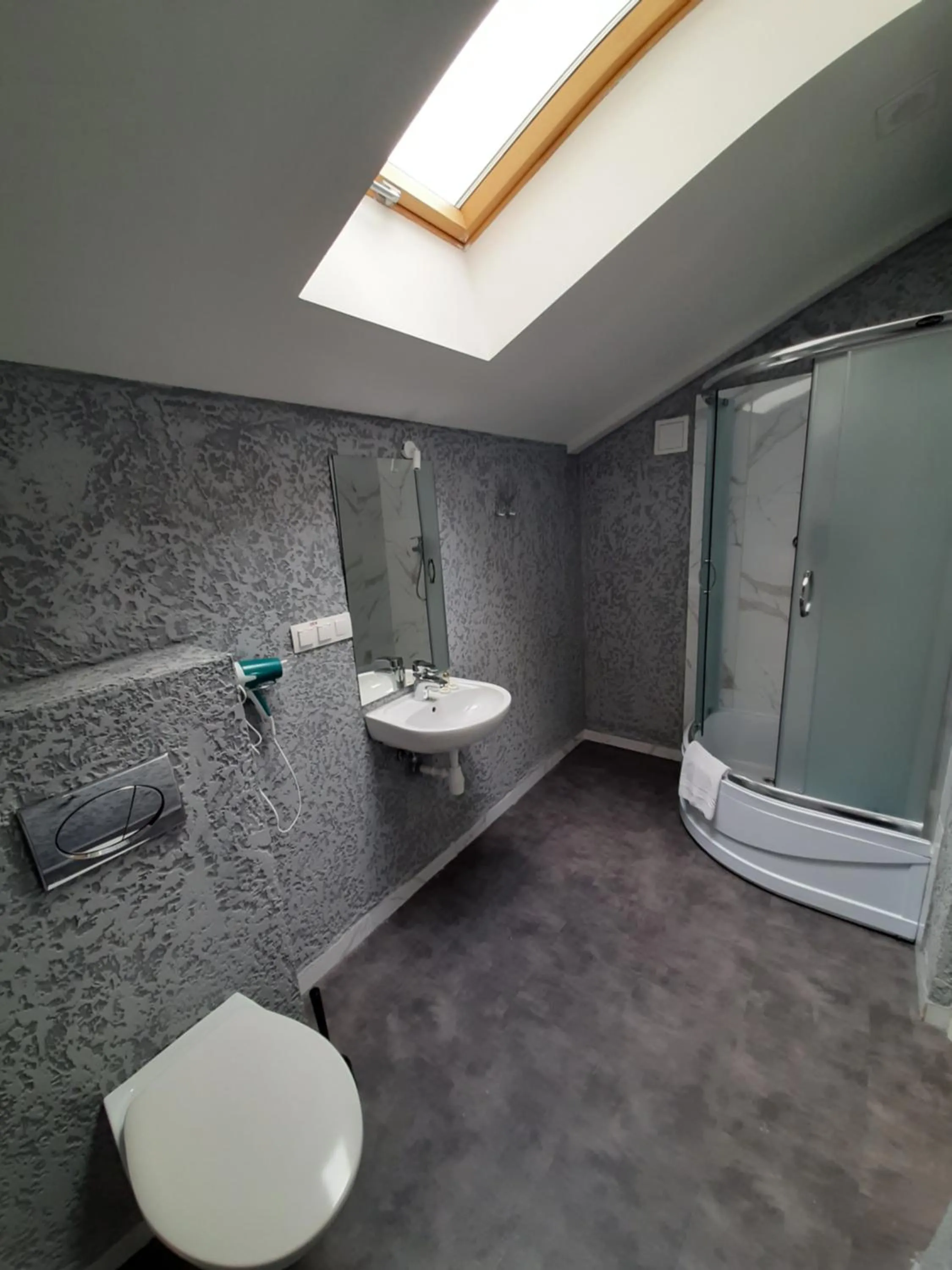 Bathroom in Coin Hotel