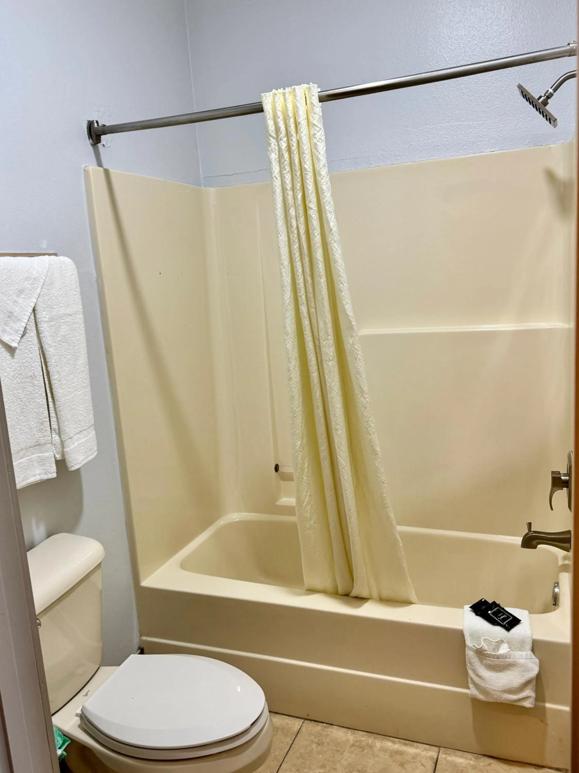 Bathroom in Texas Inn and Suites City Center at University Dr.