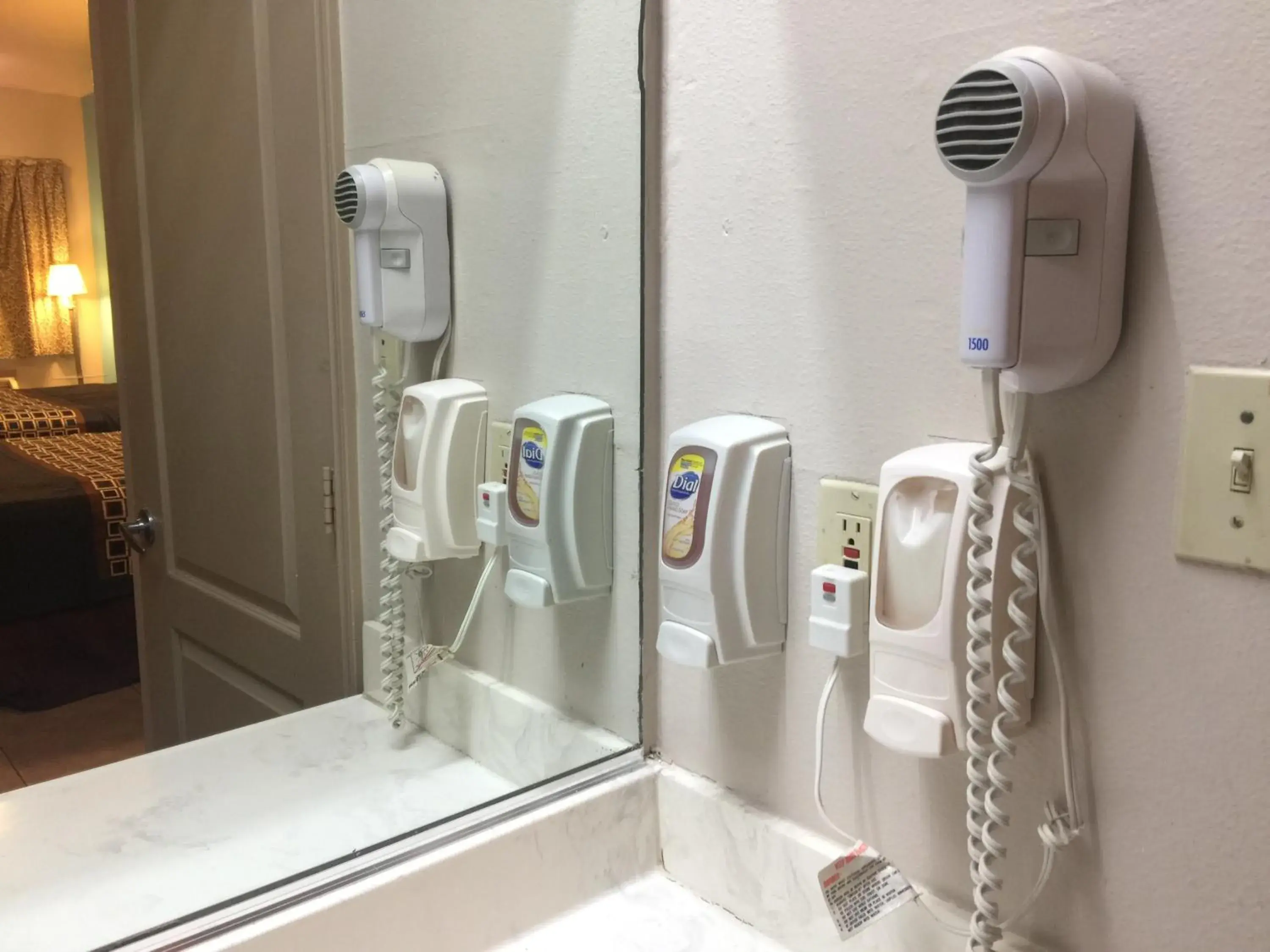 Bathroom in Texas Inn and Suites City Center at University Dr.