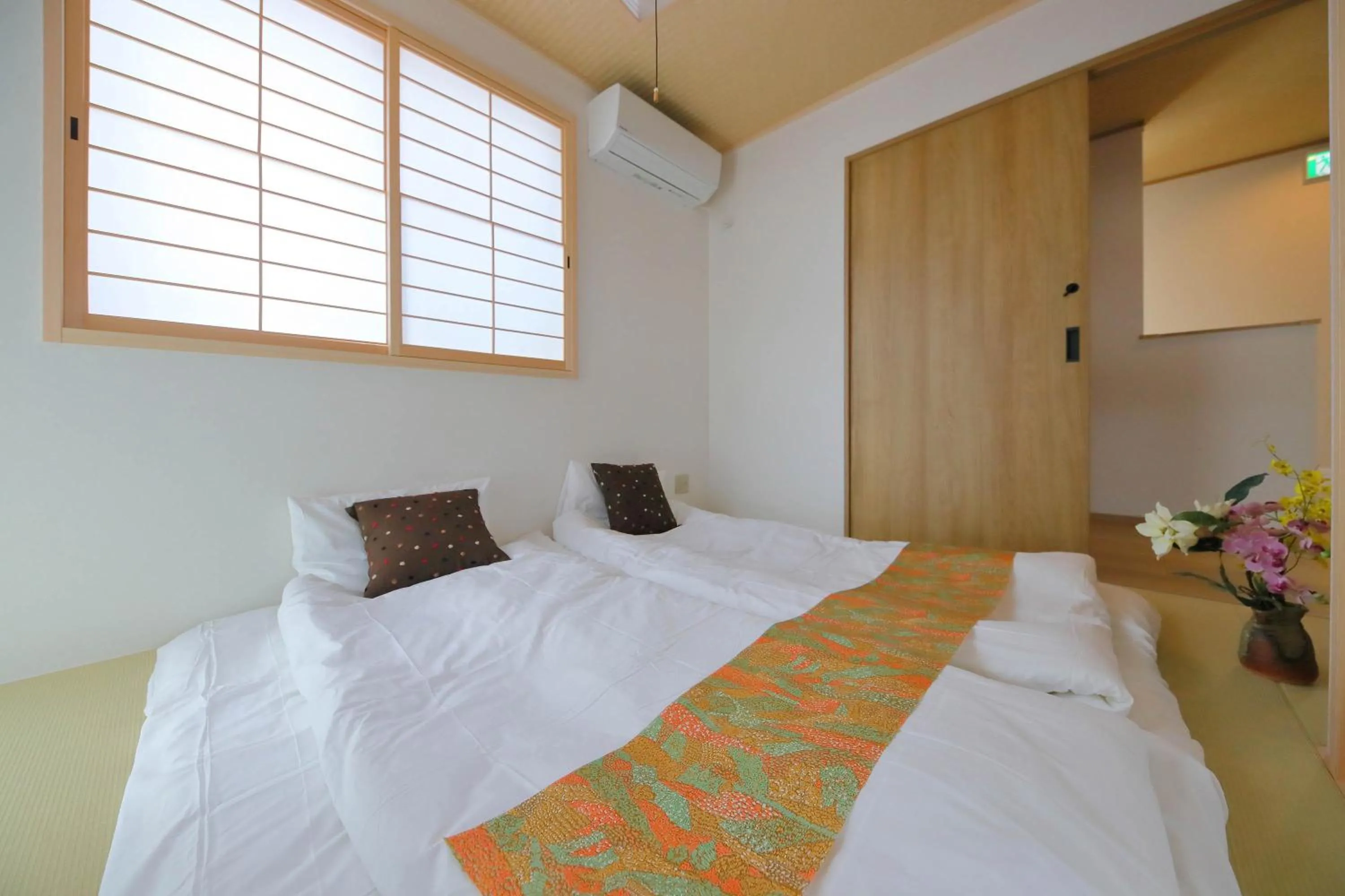 Bed in Kyo Machiya Ryokan Yuan