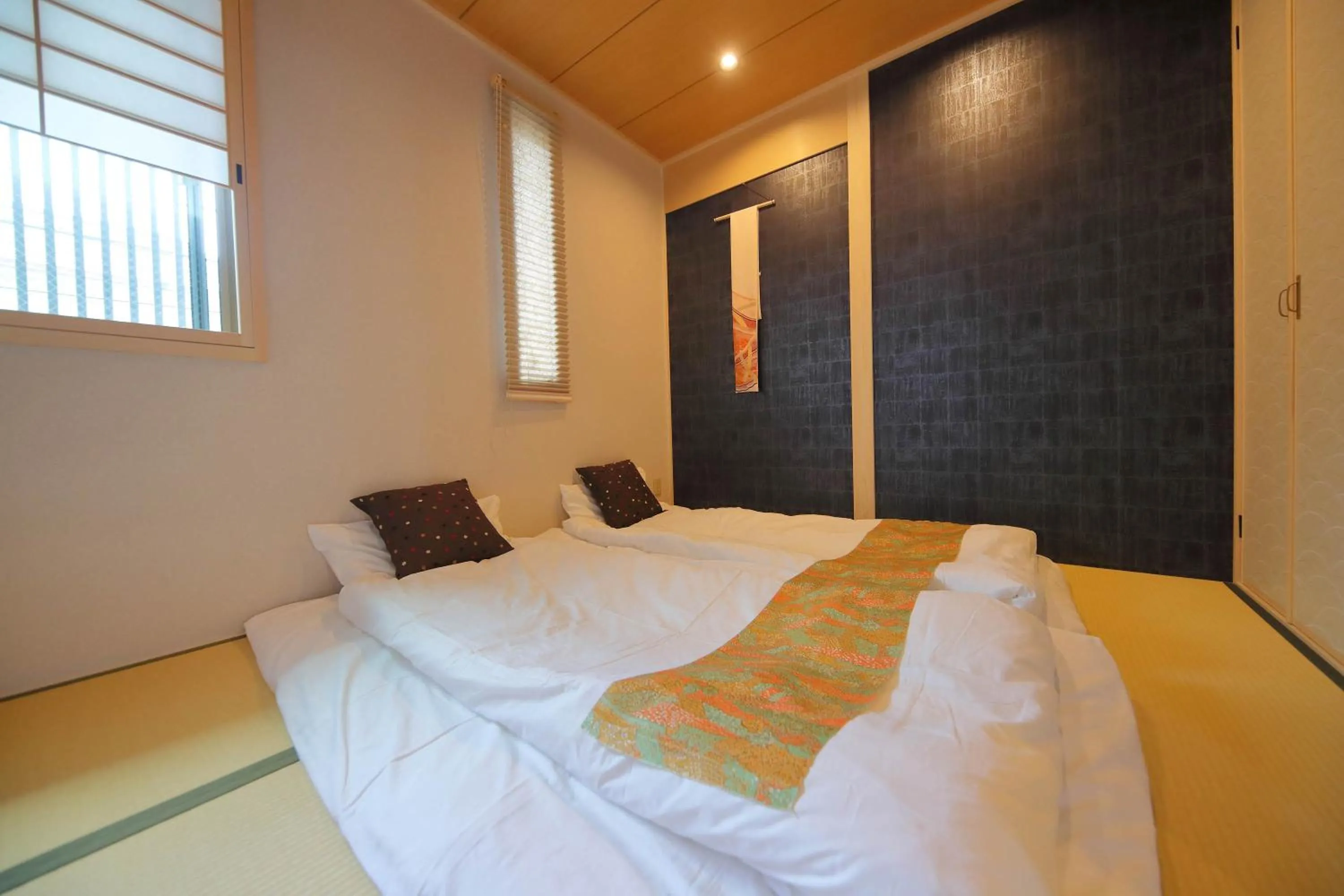 Bed in Kyo Machiya Ryokan Yuan