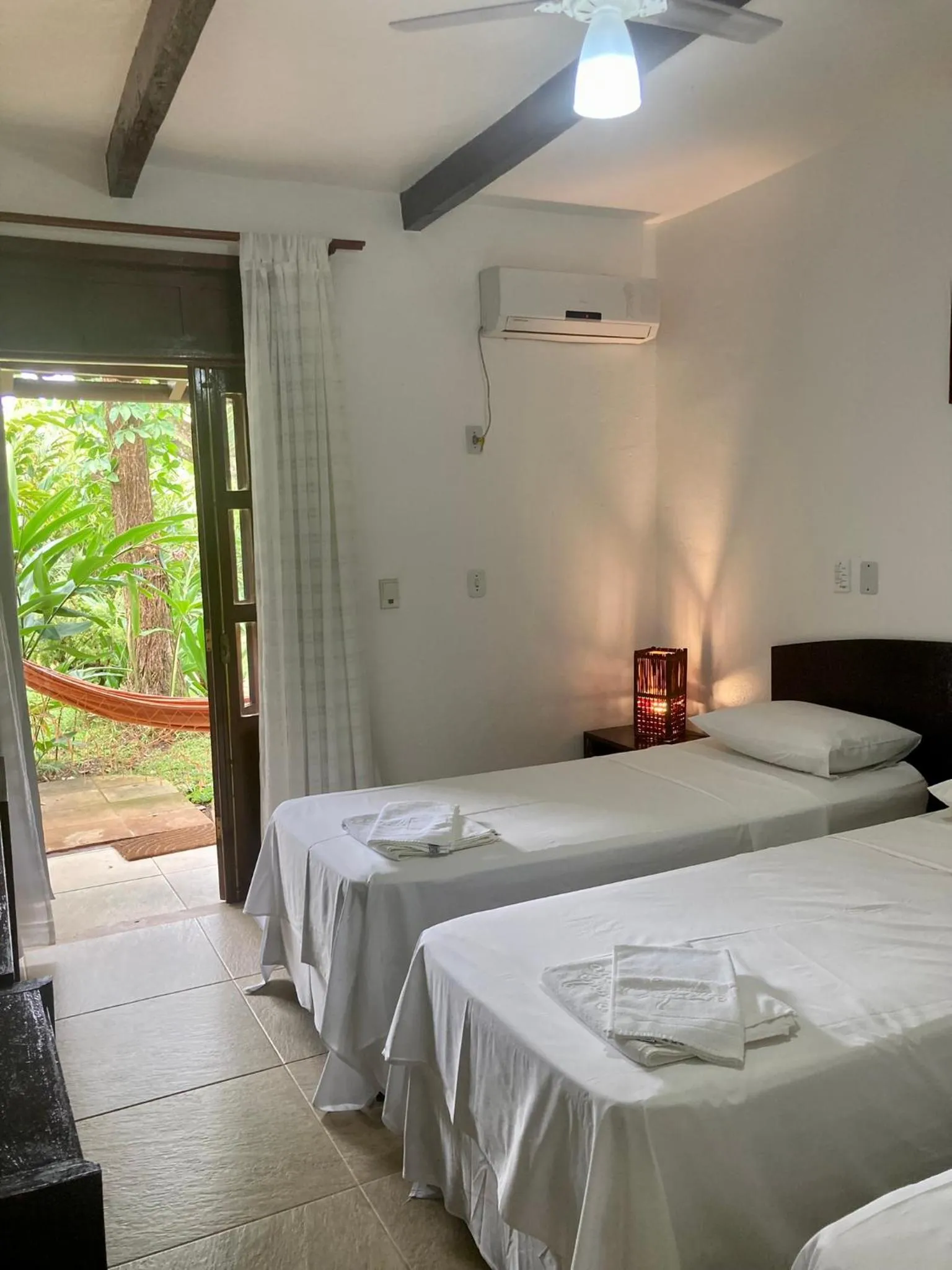 Bed in Pousada Coqueiro Verde