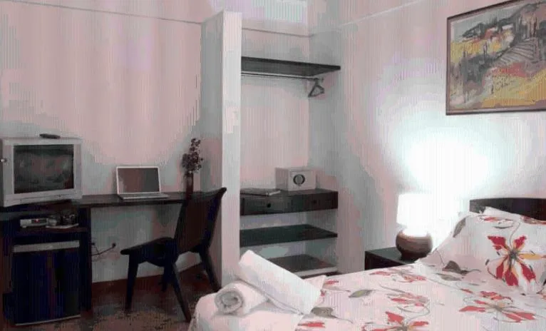 Photo of the whole room, Bed in Pousada Coqueiro Verde