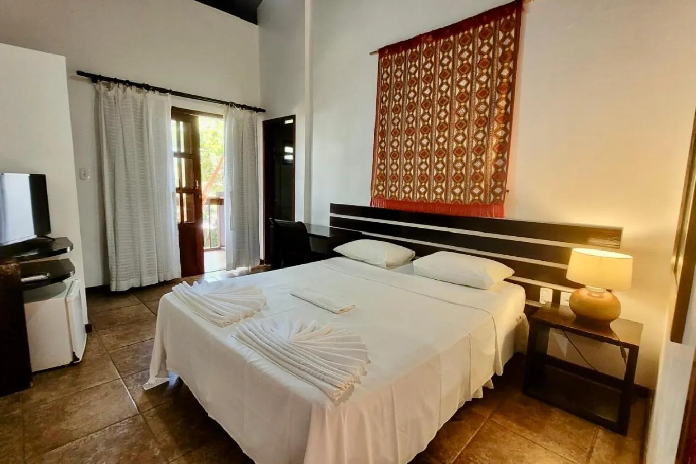 Bed in Pousada Coqueiro Verde