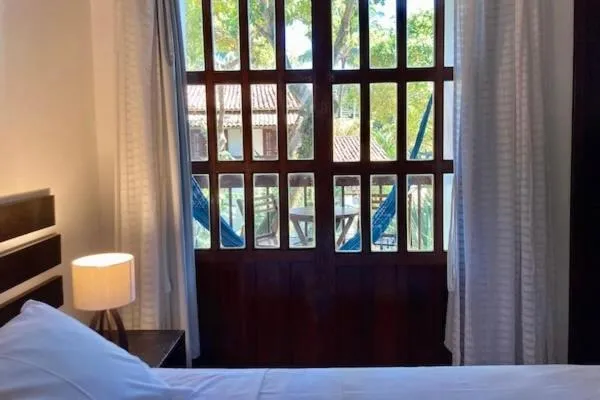 Bed in Pousada Coqueiro Verde