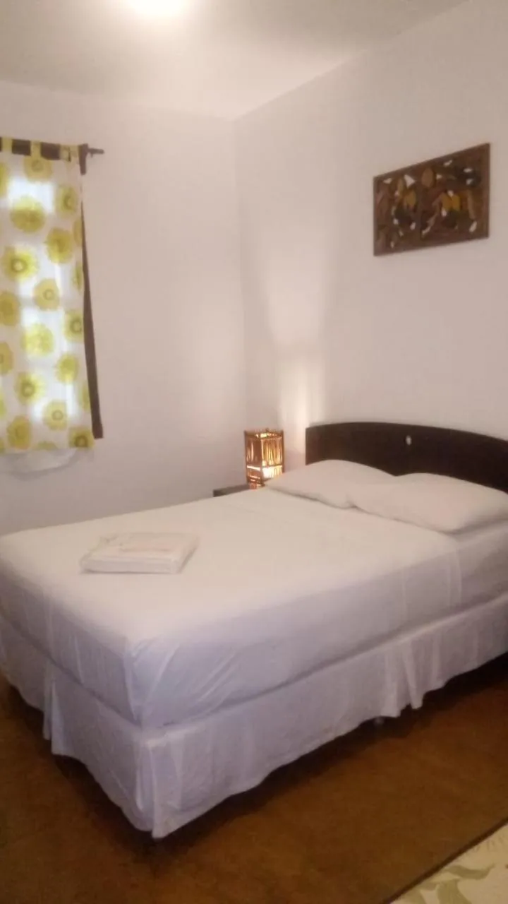 Bed in Pousada Coqueiro Verde