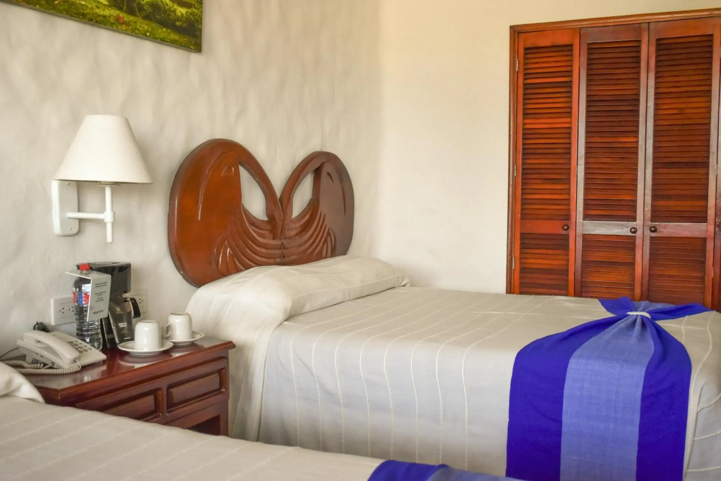 Bed in Hotel Quijote Inn Bed in Hotel Quijote Inn