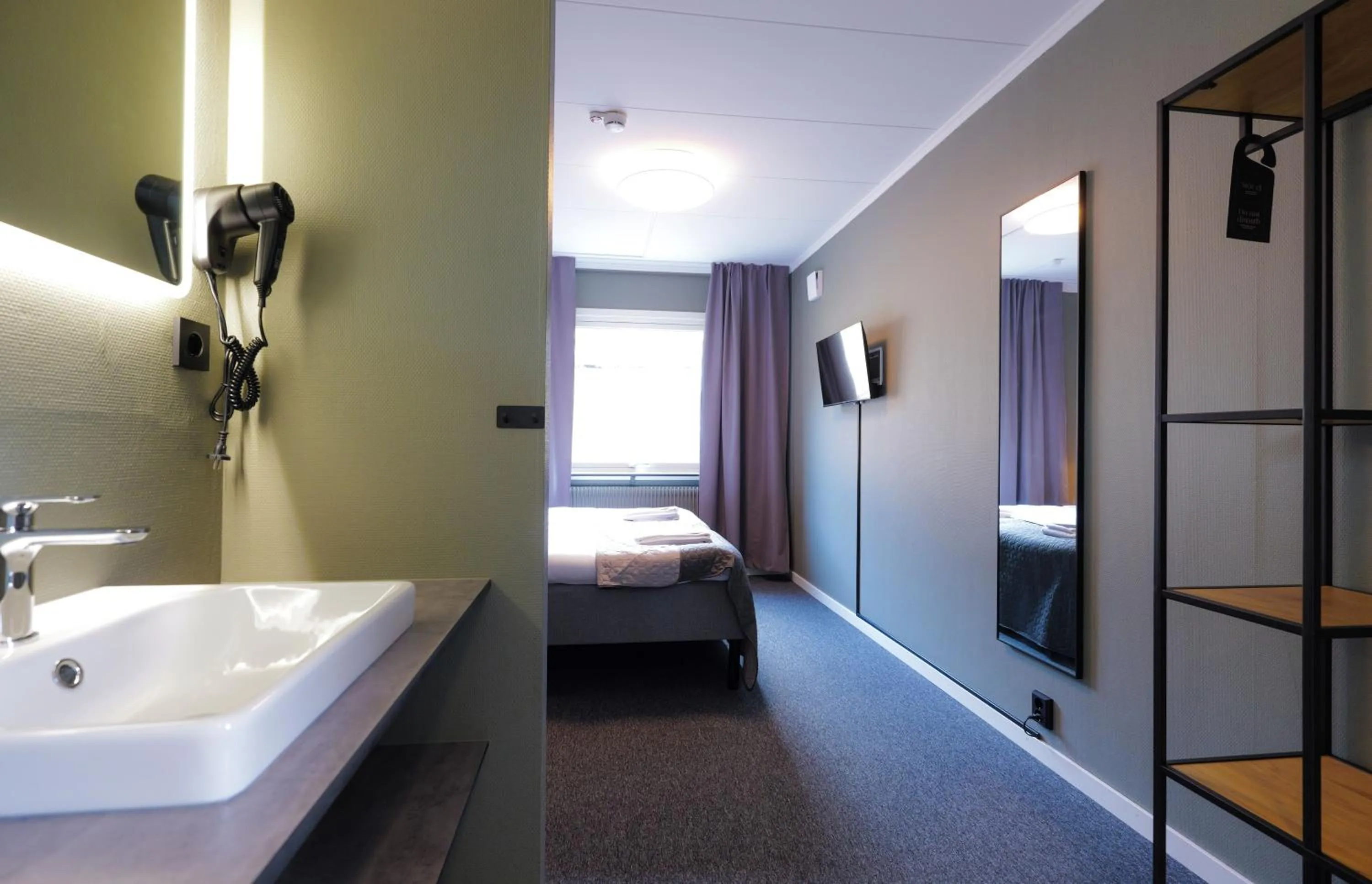 Photo of the whole room, Bed in Hotell Veckefjärden