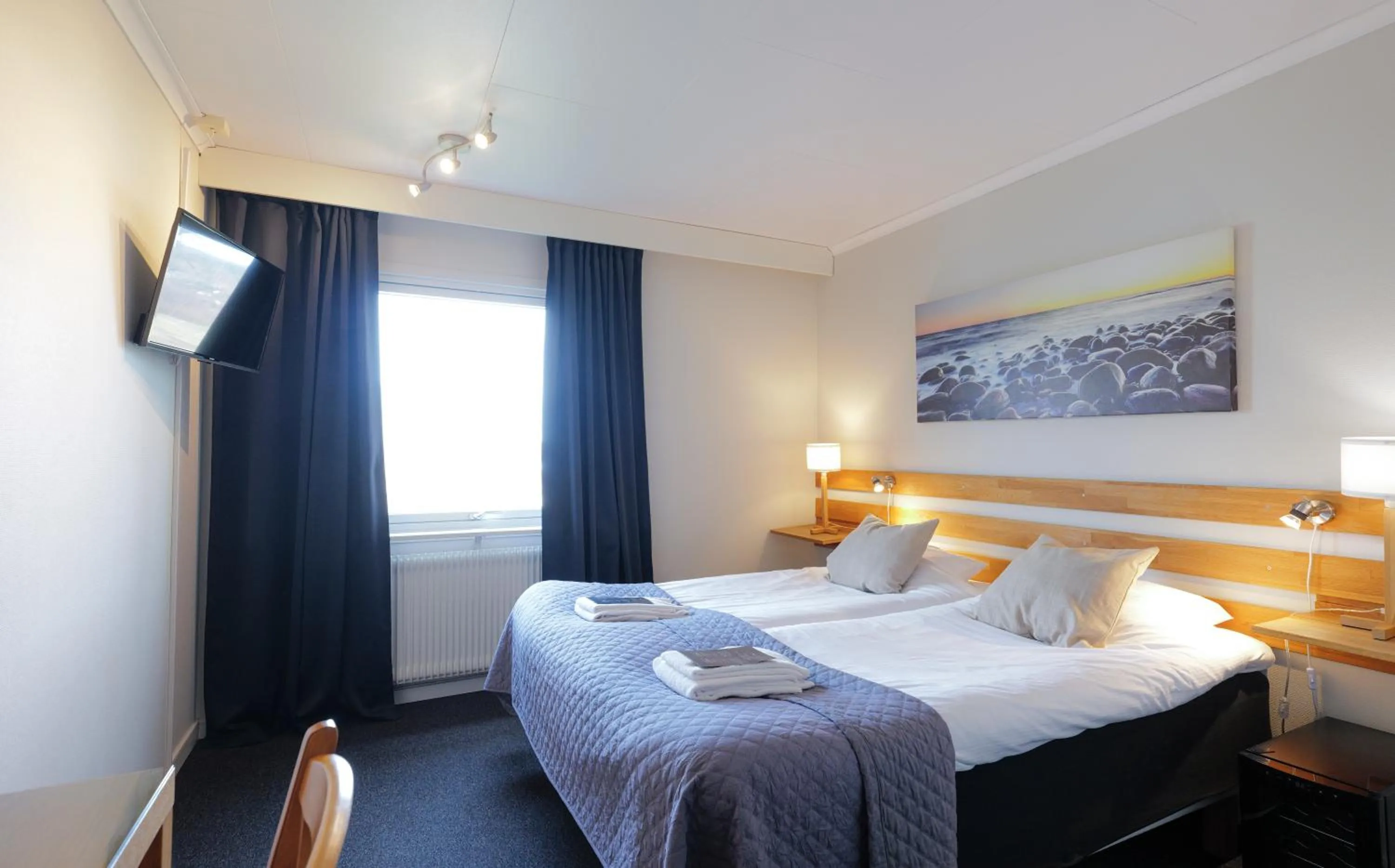 Photo of the whole room, Bed in Hotell Veckefjärden