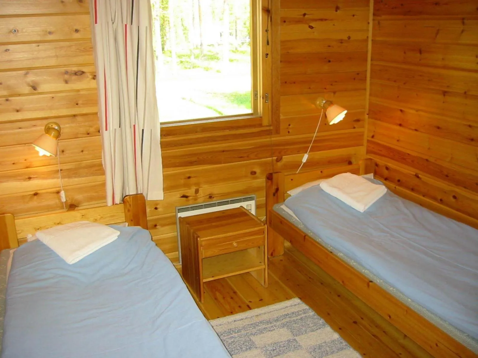 Bed in Ukonjärven Holiday Village