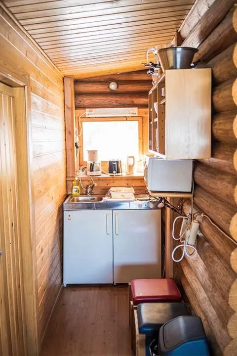 Kitchen or kitchenette in Ukonjärven Holiday Village