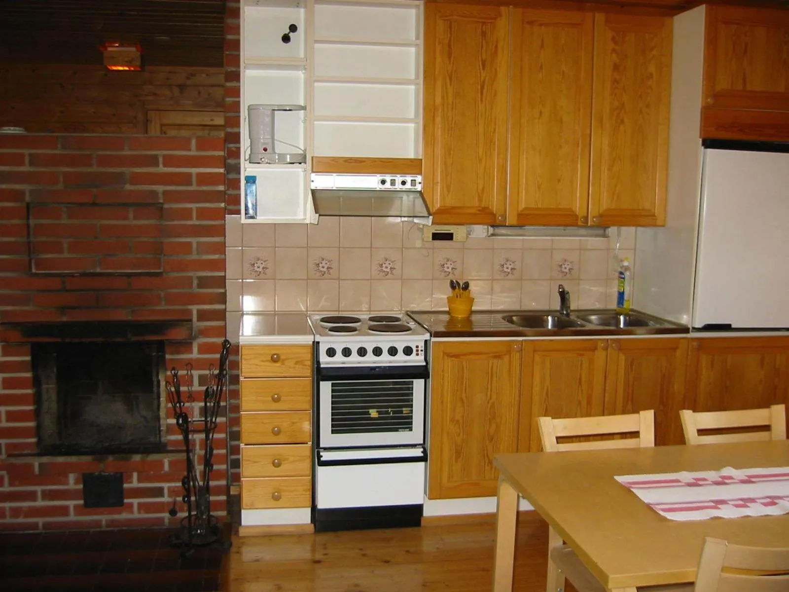 Kitchen or kitchenette in Ukonjärven Holiday Village