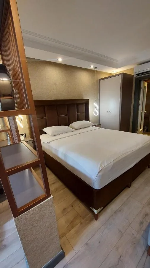 Bed in Unluselek Hotel