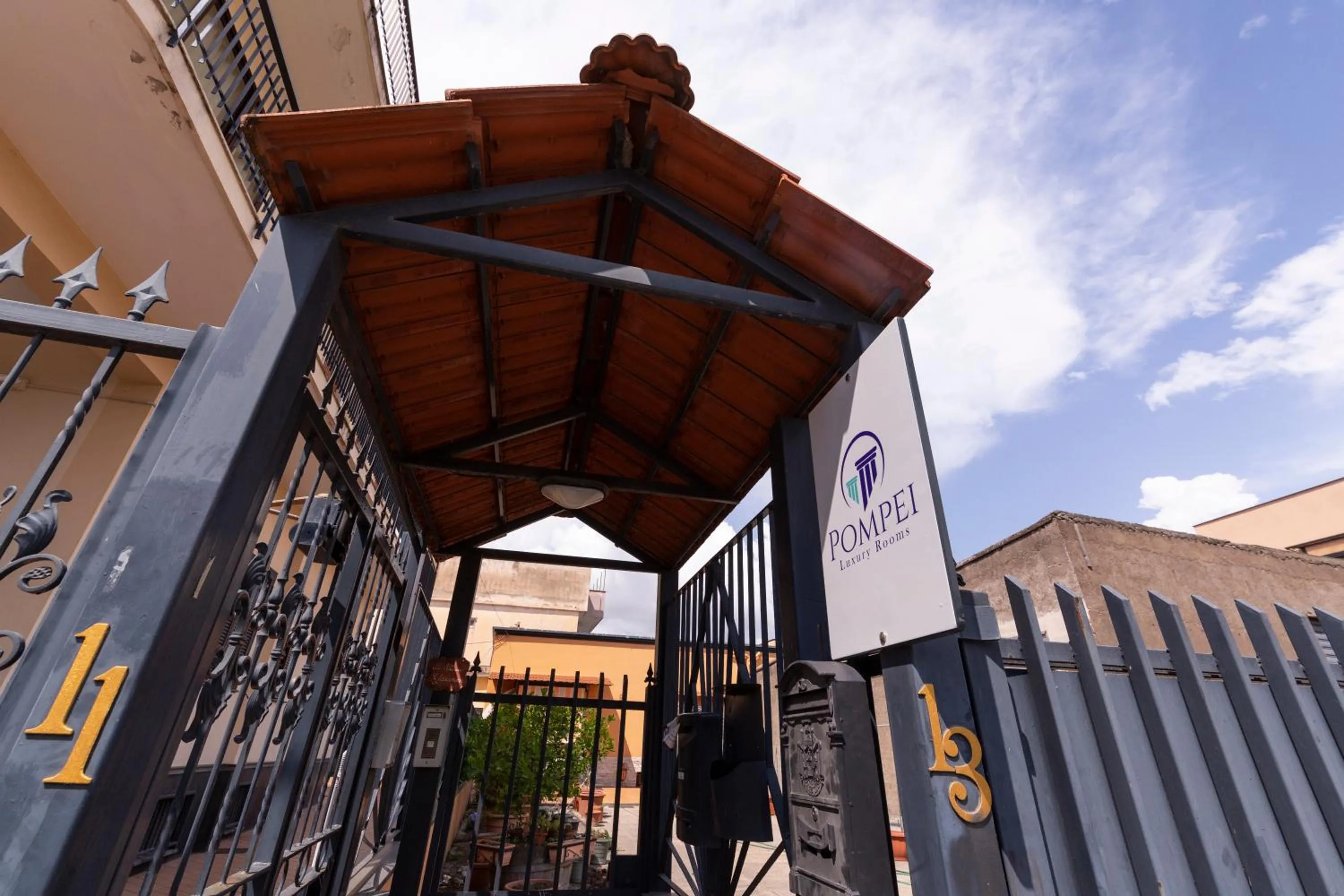 Property building in Pompei Luxury Rooms