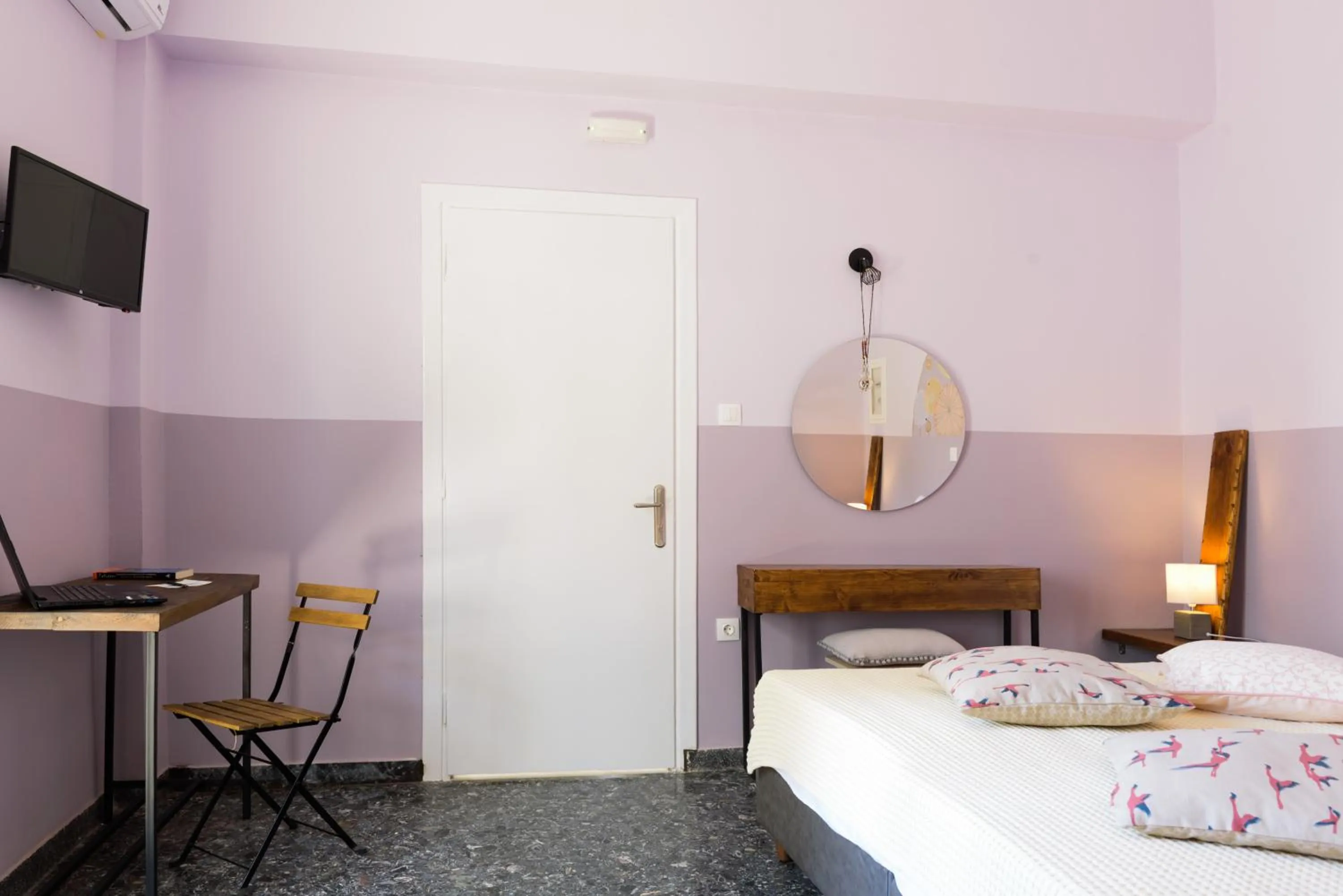 Seating area, Bed in Kalamata Art Rooms