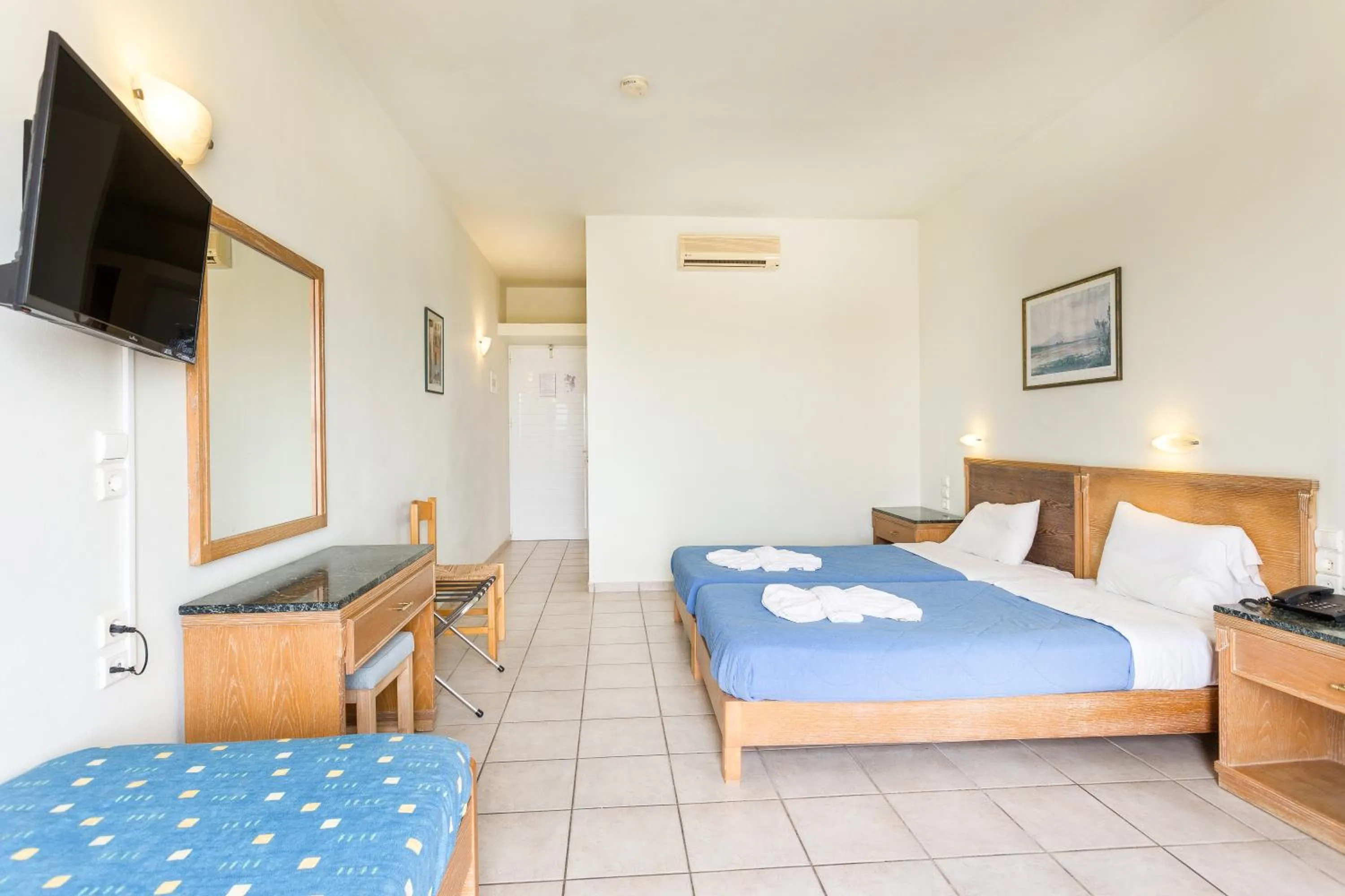 Bed in Alonia Hotel Apartments
