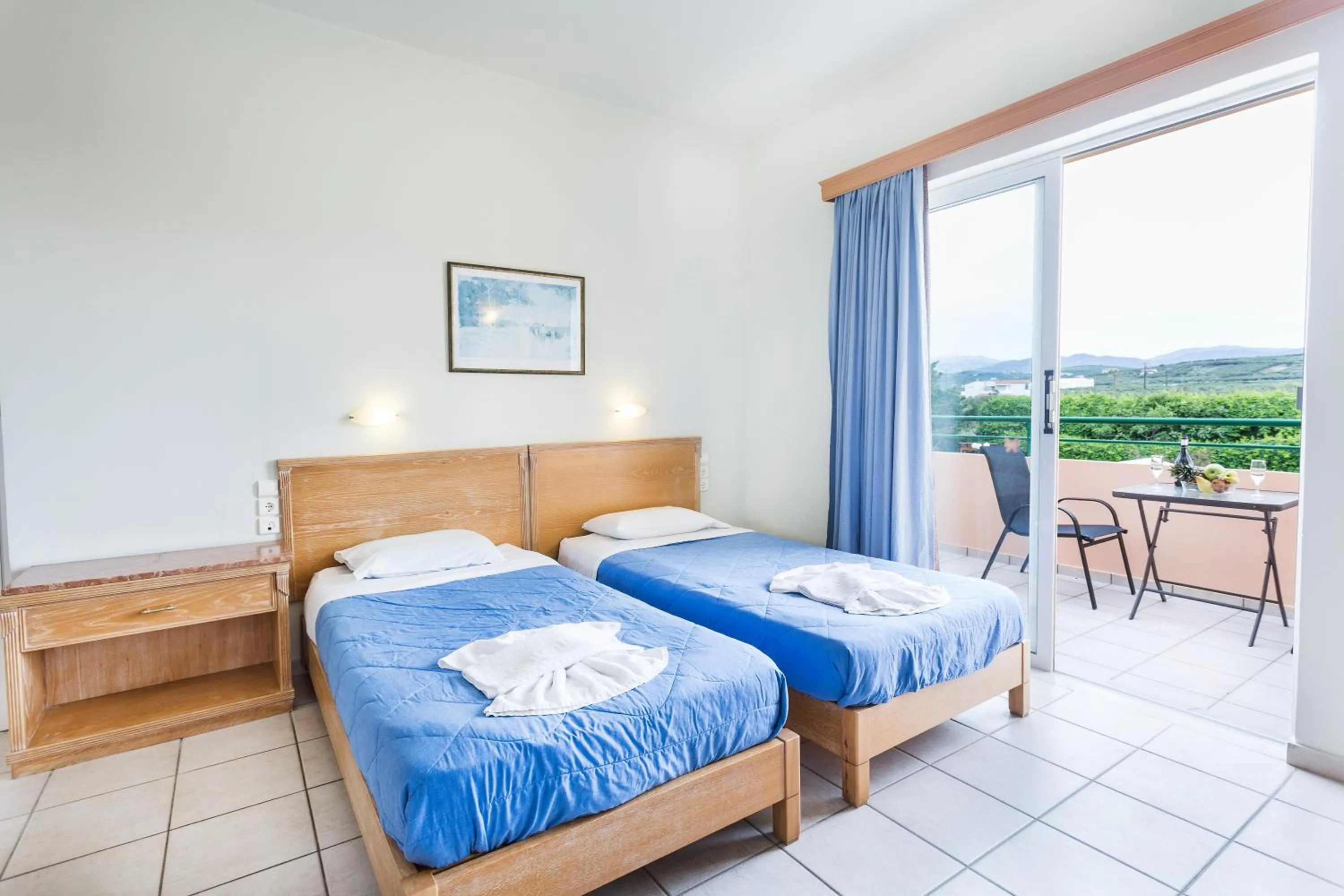 Bed in Alonia Hotel Apartments