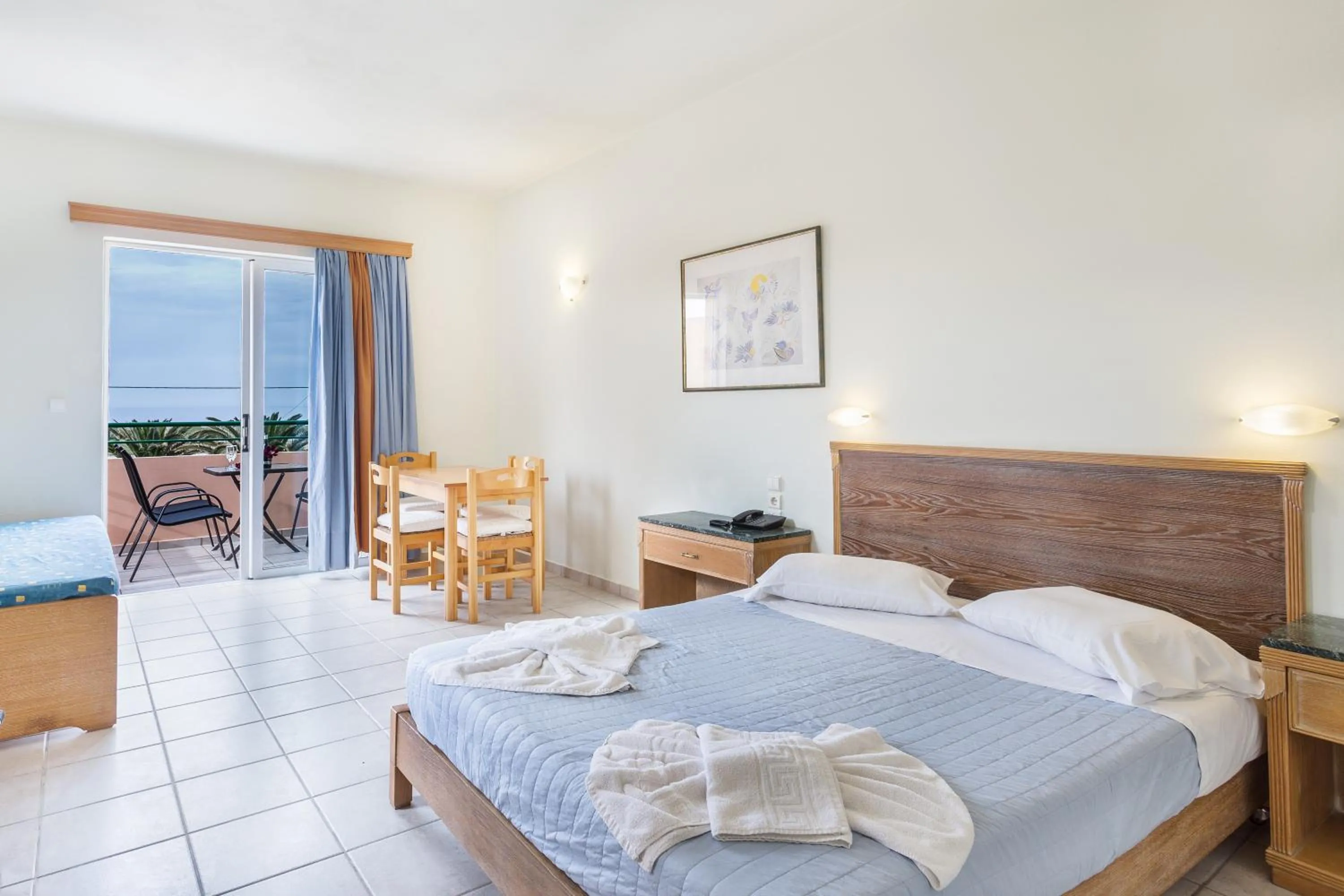 Bed in Alonia Hotel Apartments