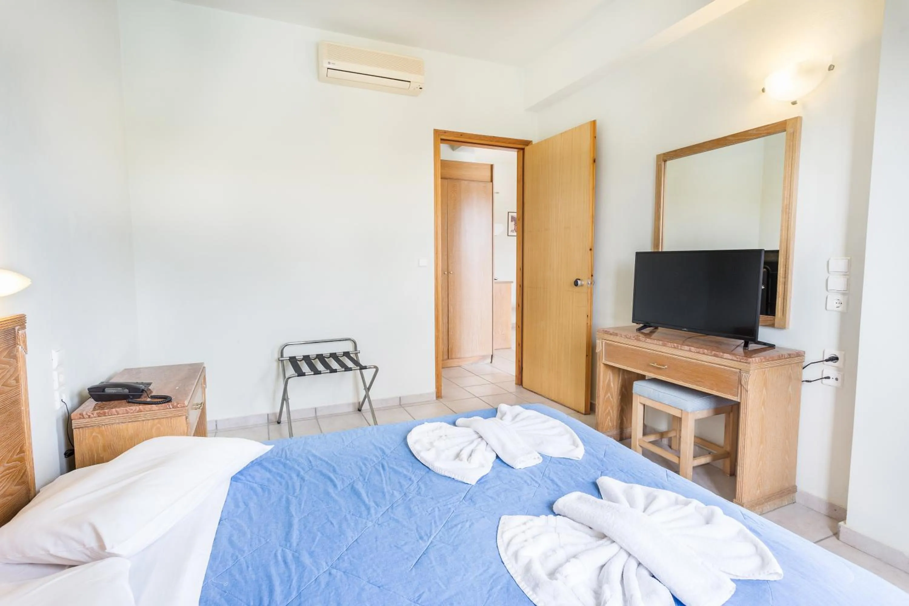 Bed in Alonia Hotel Apartments