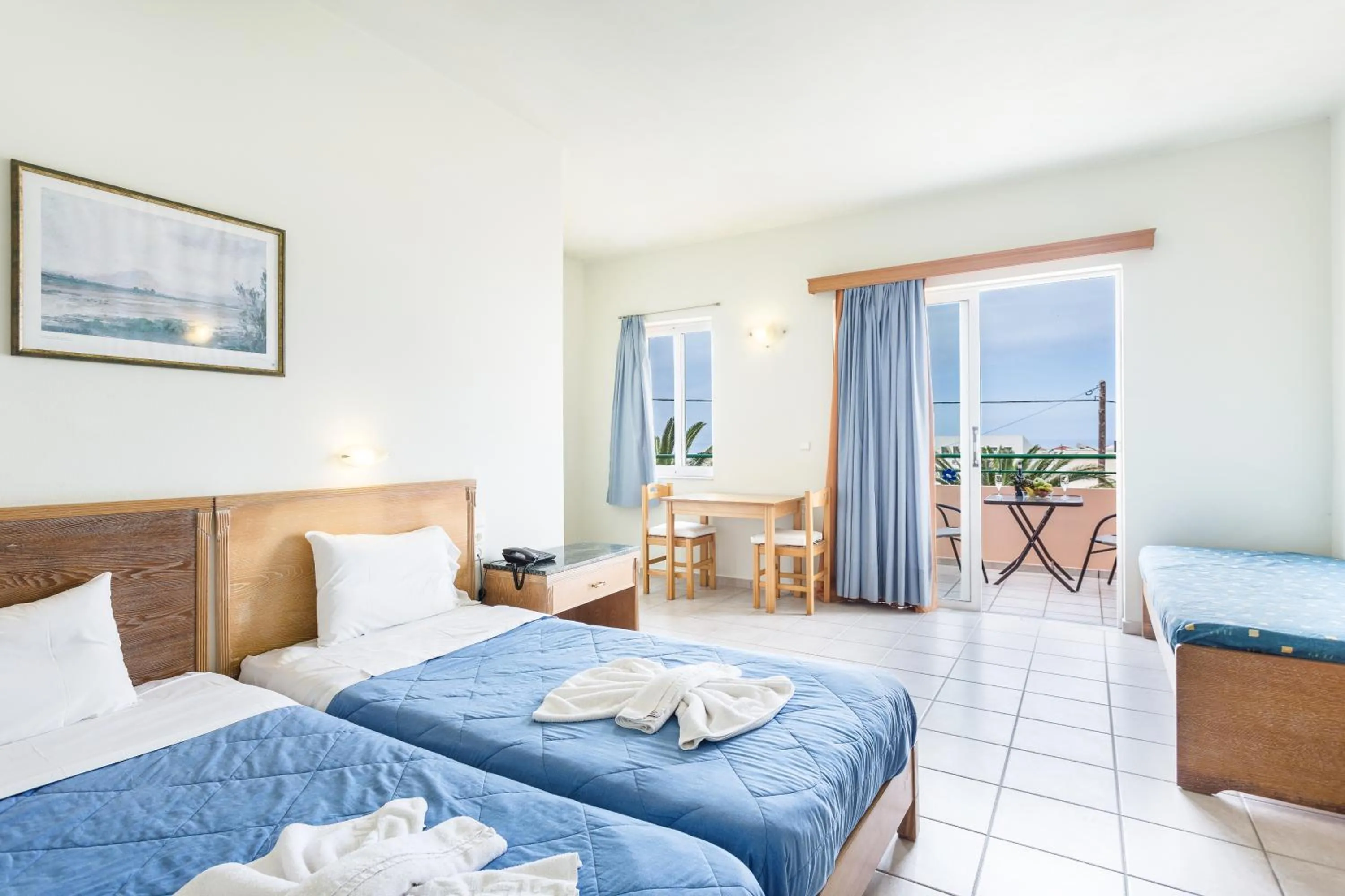 Bed in Alonia Hotel Apartments