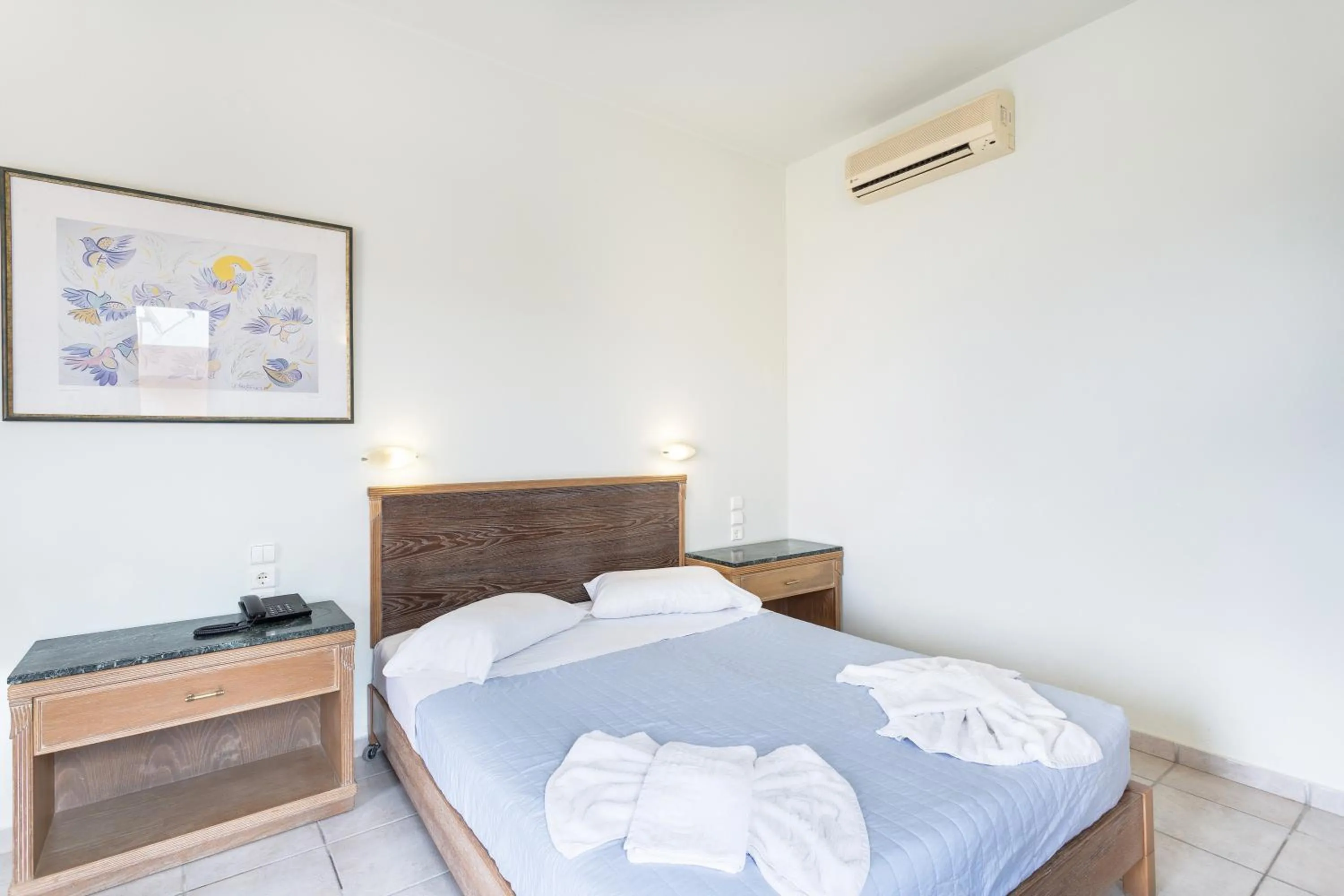 Bed in Alonia Hotel Apartments
