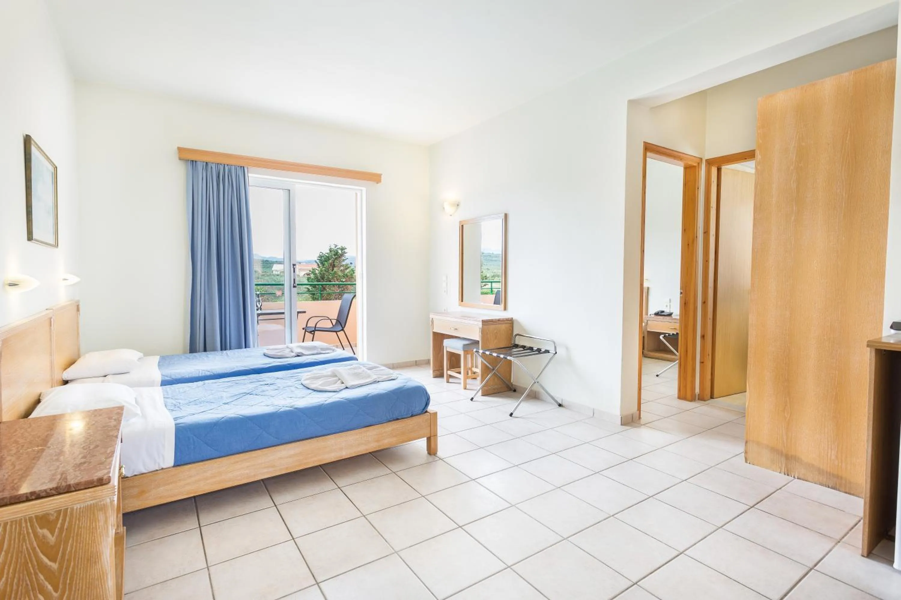 Bed in Alonia Hotel Apartments
