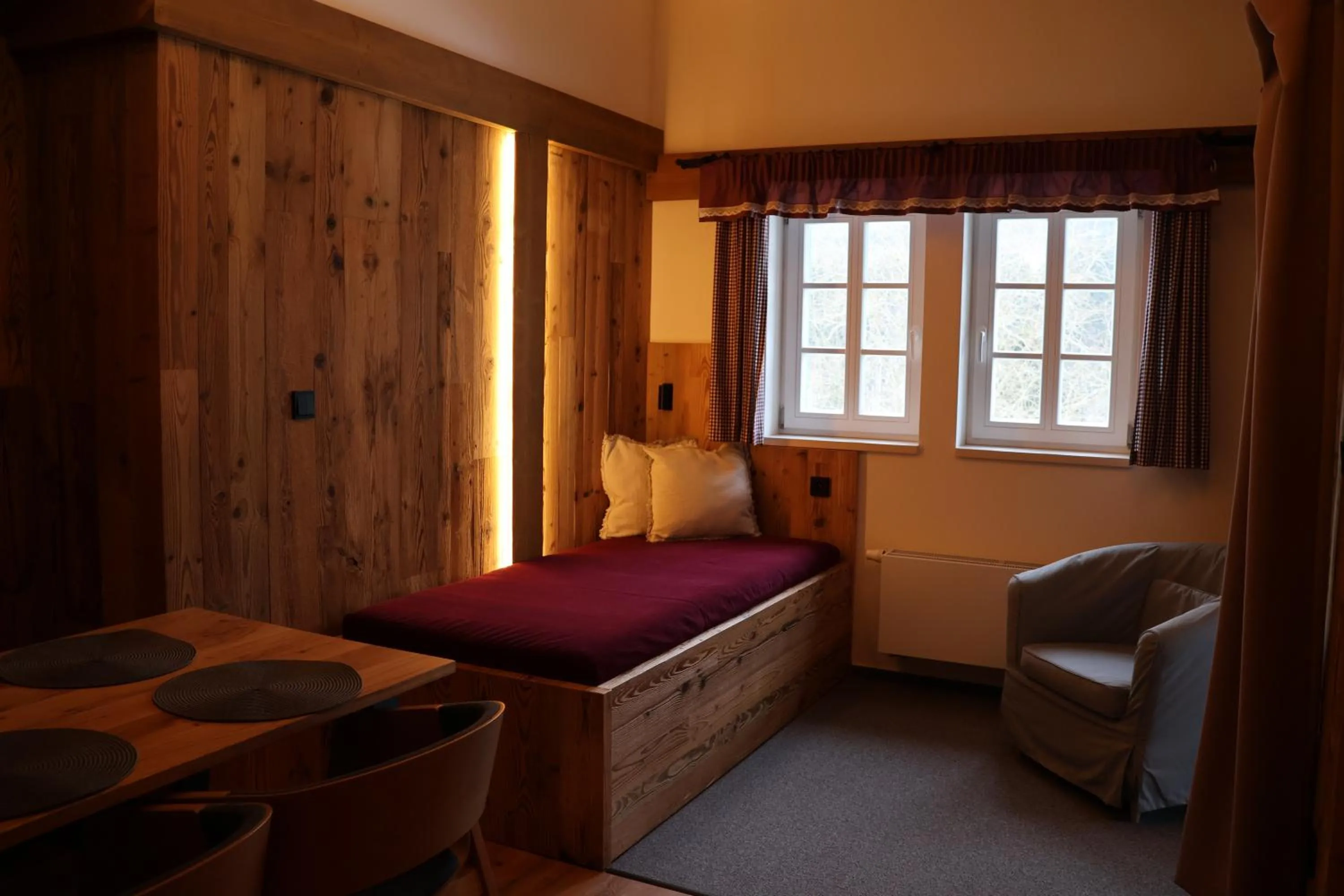 Seating area, Bed in Penzion Brnenka
