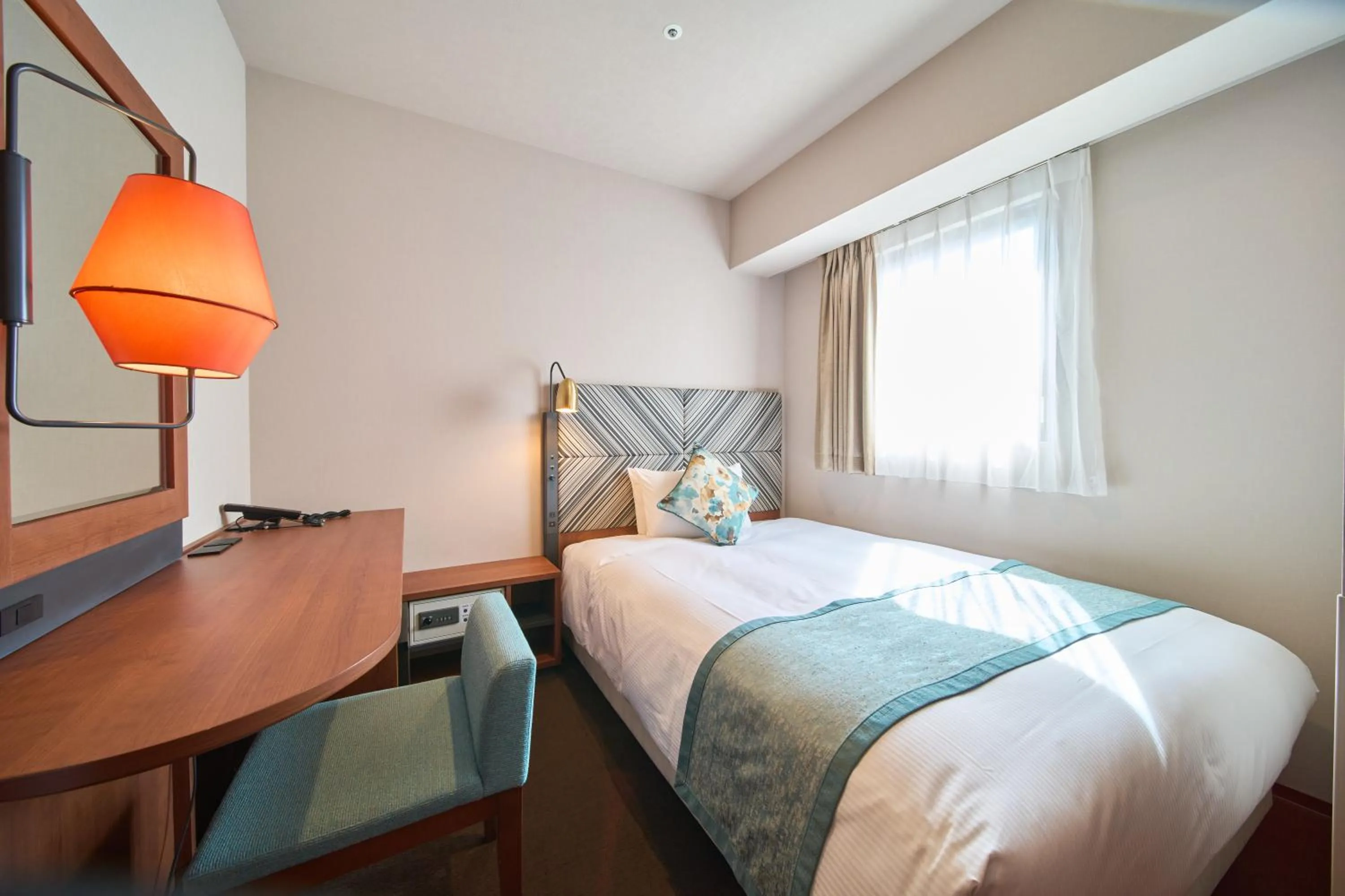 Bed in Meitetsu Inn Nagoya Kanayama Annex