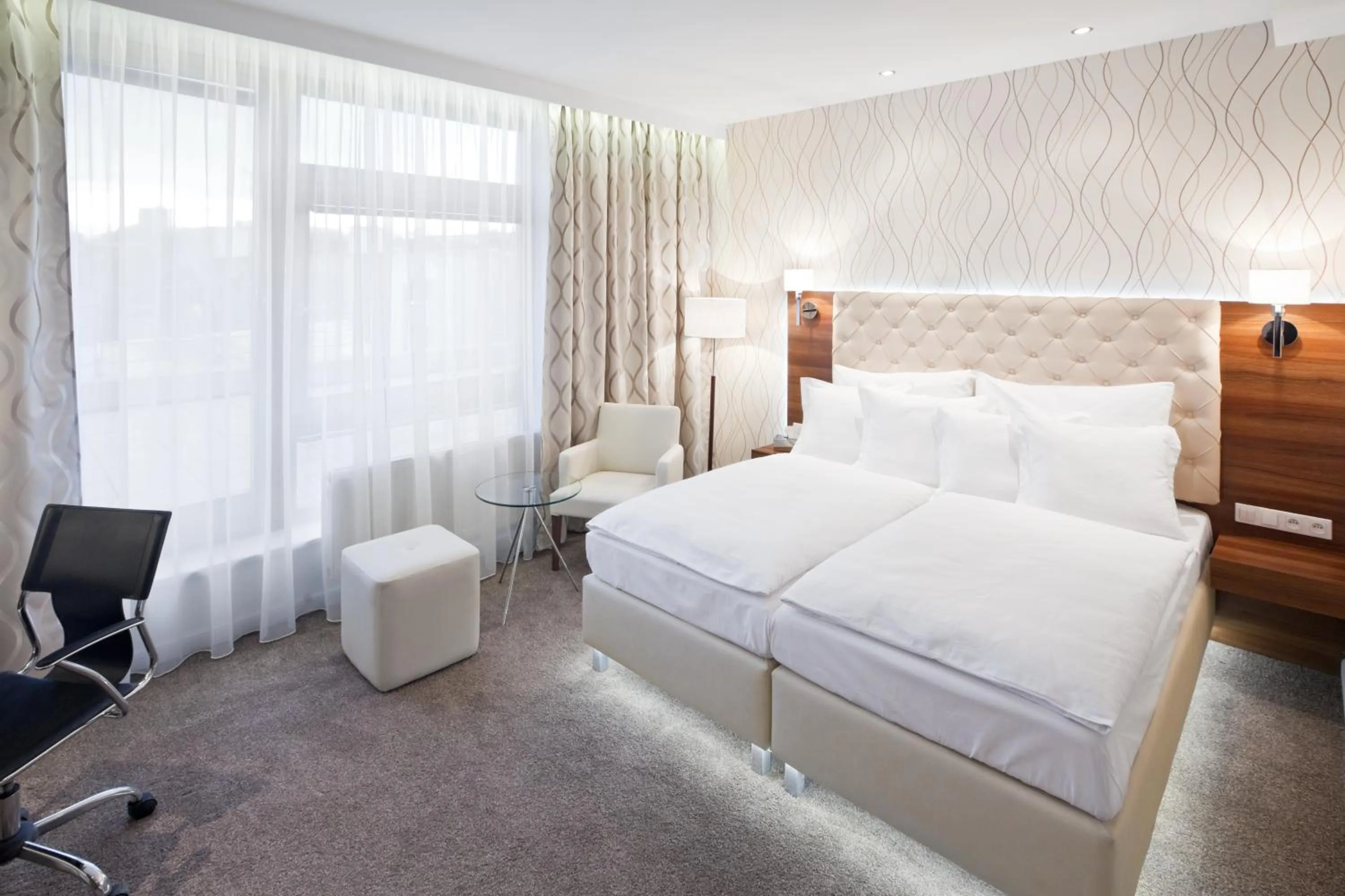 Bed in Pytloun City Boutique Self Check-in Hotel