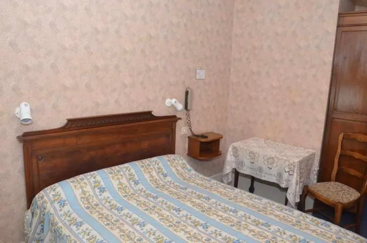 Bed in Hotel du Commerce