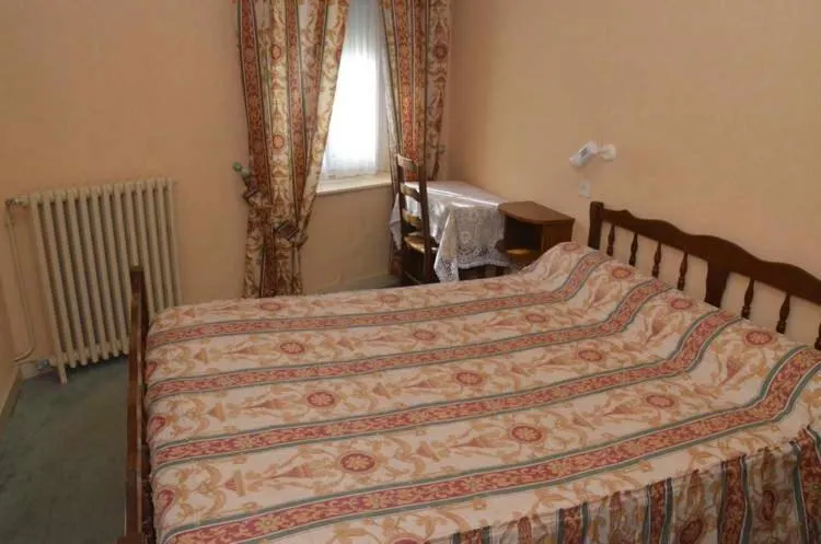 Bed in Hotel du Commerce