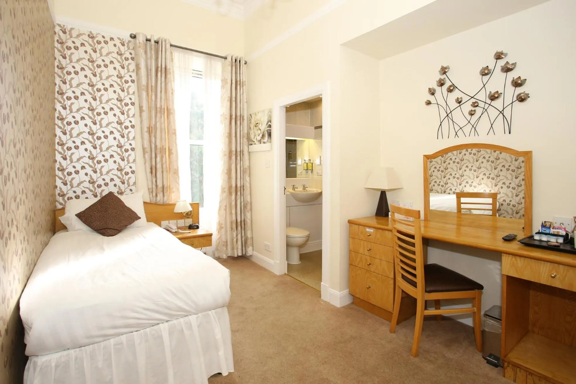 Bed in Woodlands Hotel, BW Signature Collection