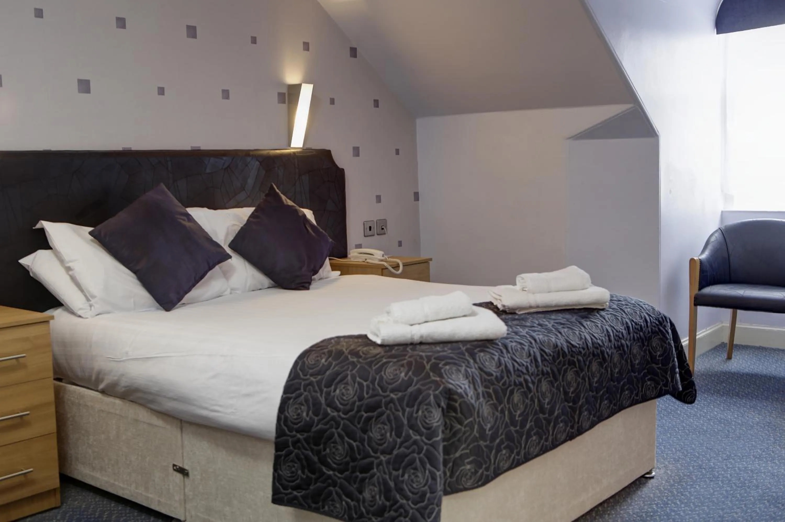 Bed in Woodlands Hotel, BW Signature Collection