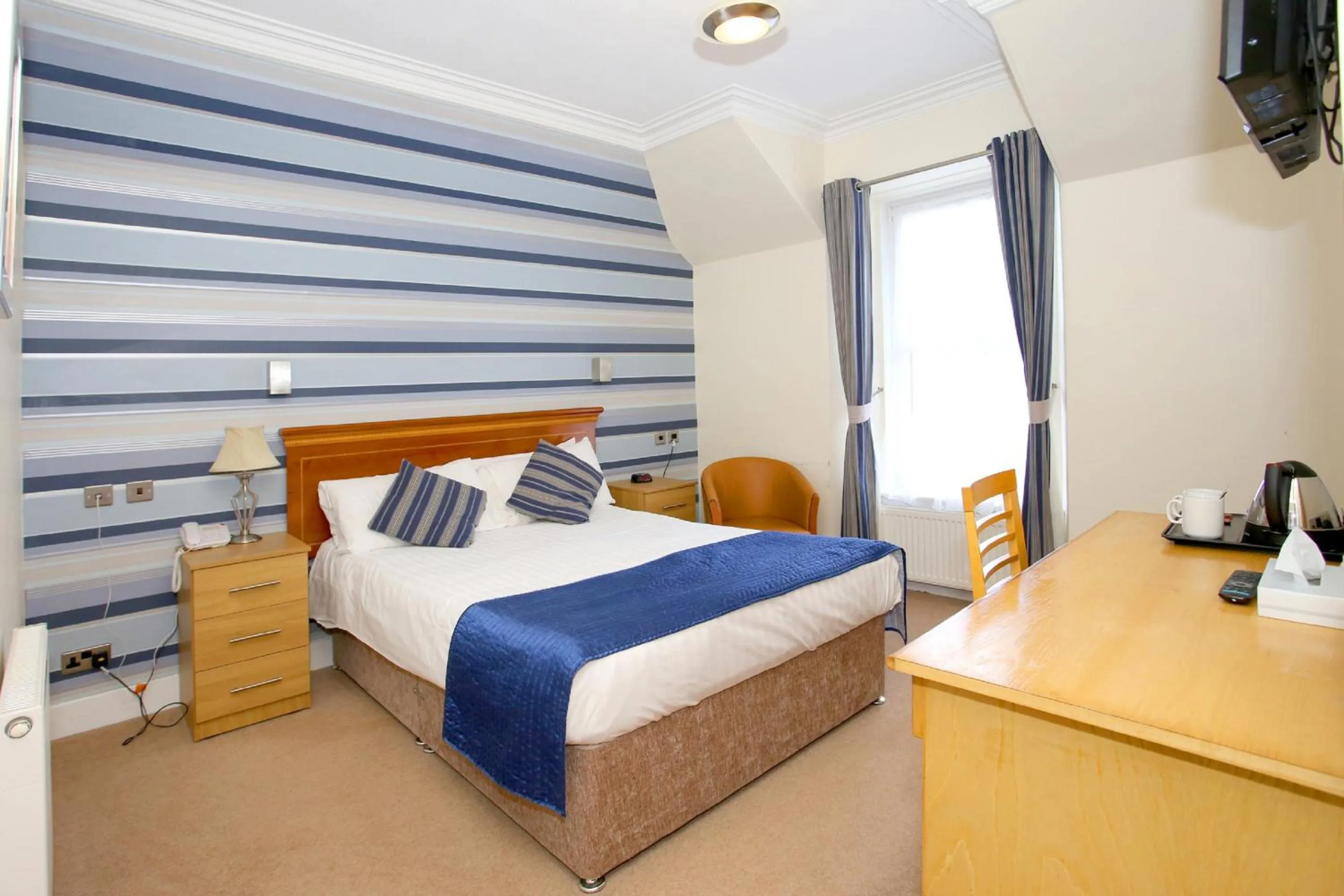 Bed in Woodlands Hotel, BW Signature Collection