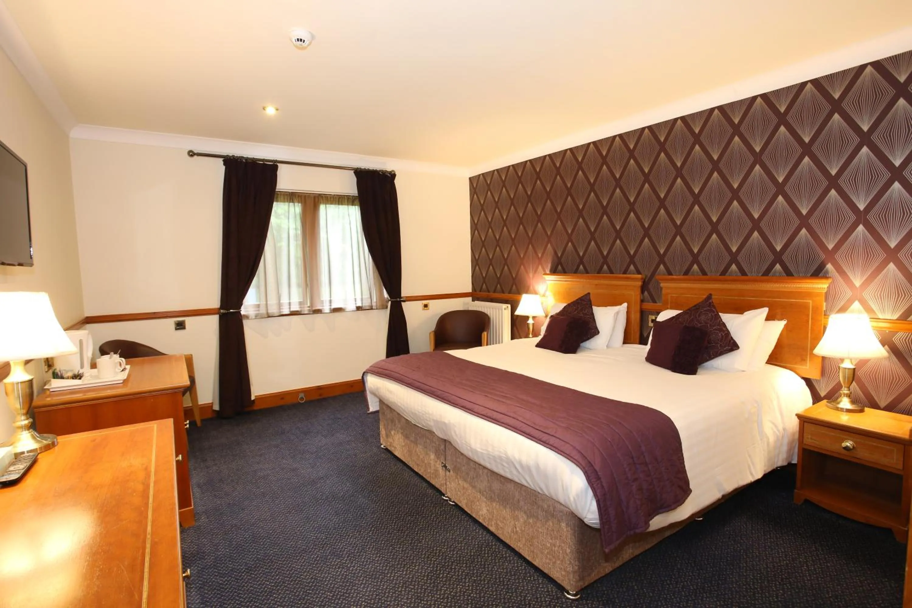 Bed in Woodlands Hotel, BW Signature Collection